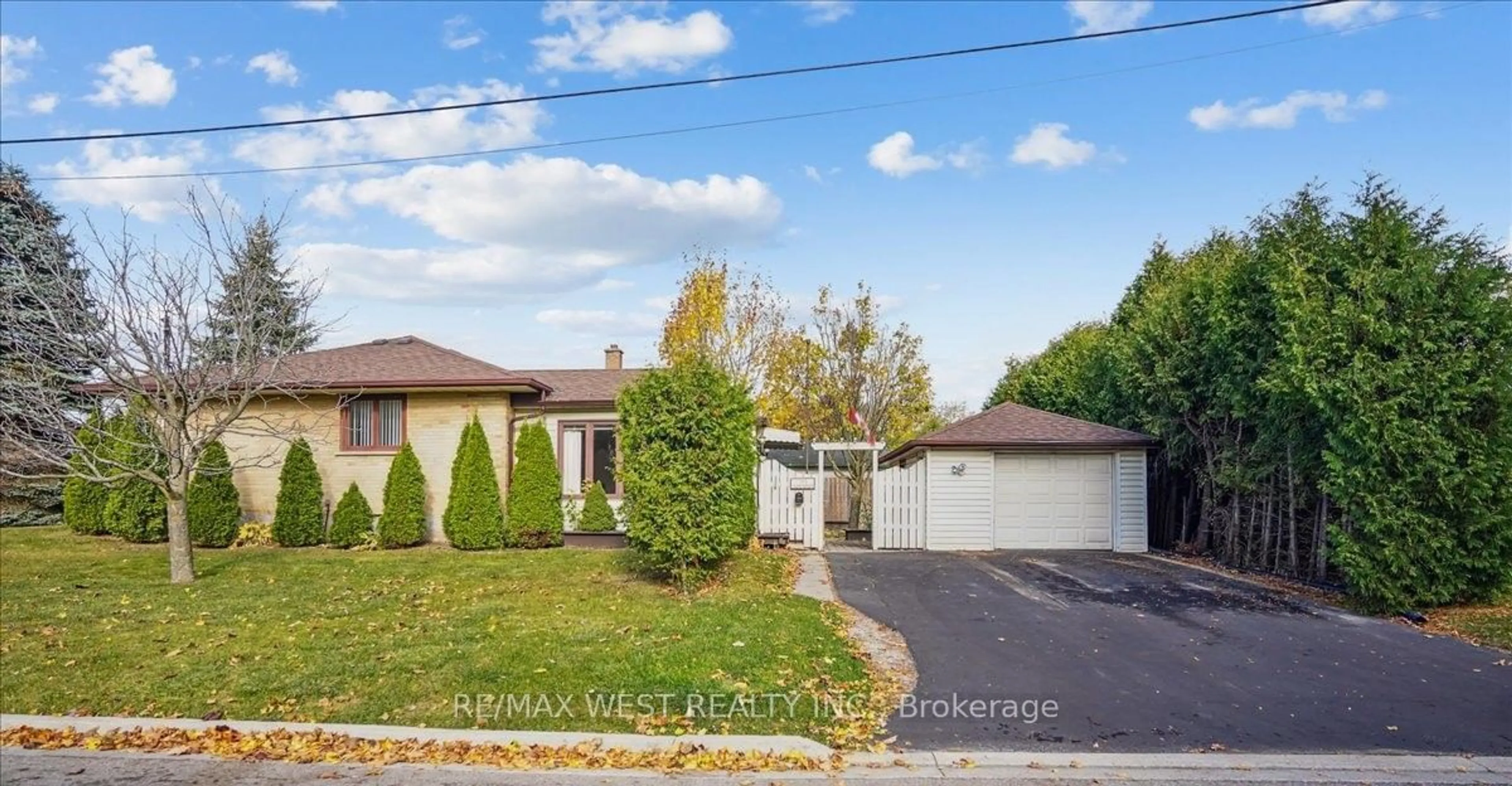 A pic from exterior of the house or condo, the fenced backyard for 705 Glenforest St, Oshawa Ontario L1J 5E9