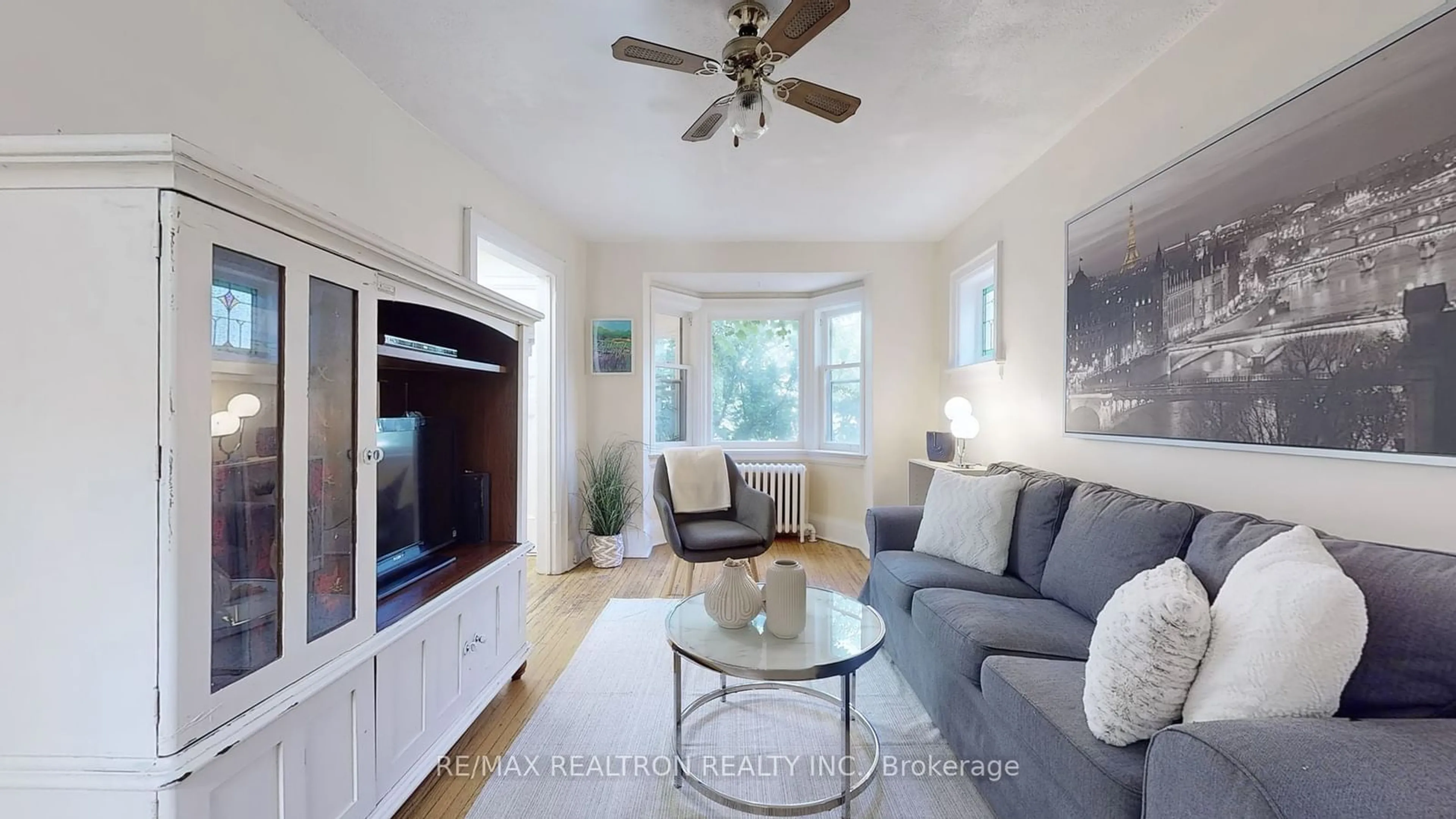 Living room, wood floors for 38 Leroy Ave, Toronto Ontario M4J 4G7