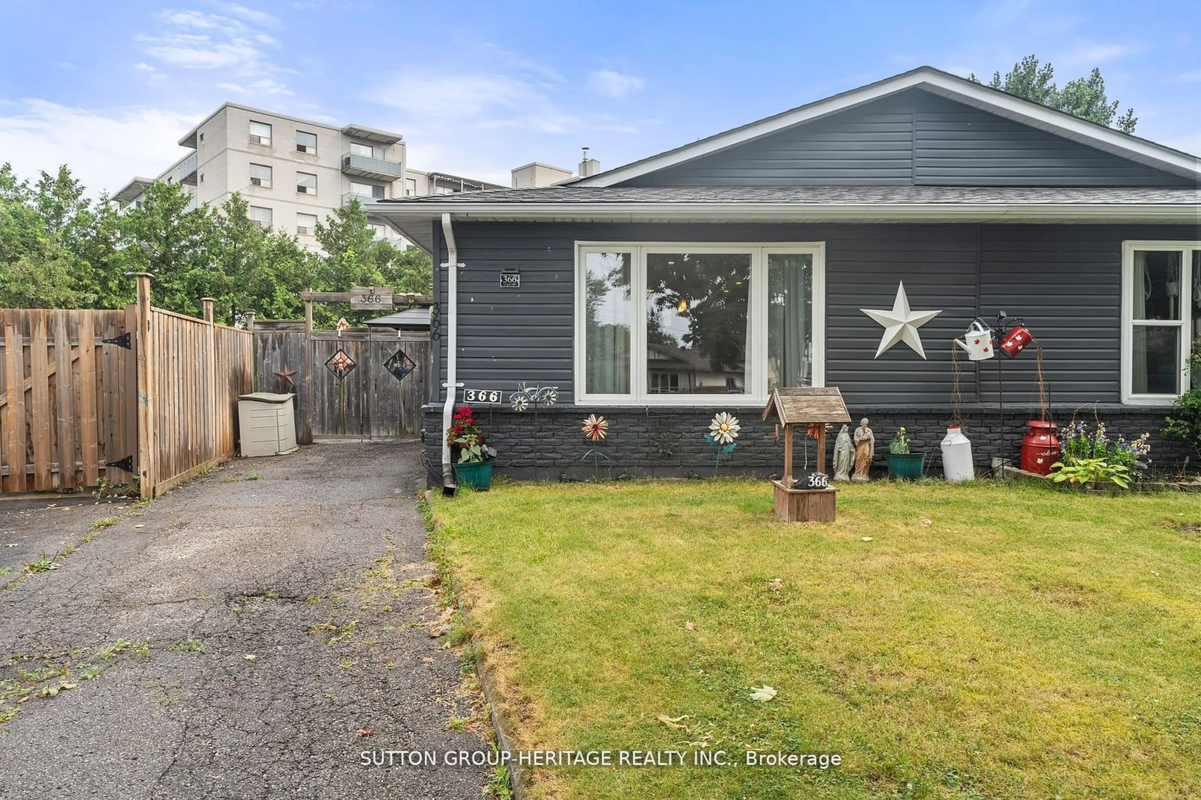 Frontside or backside of a home, the fenced backyard for 366 Calvert Crt, Oshawa Ontario L1J 6X7