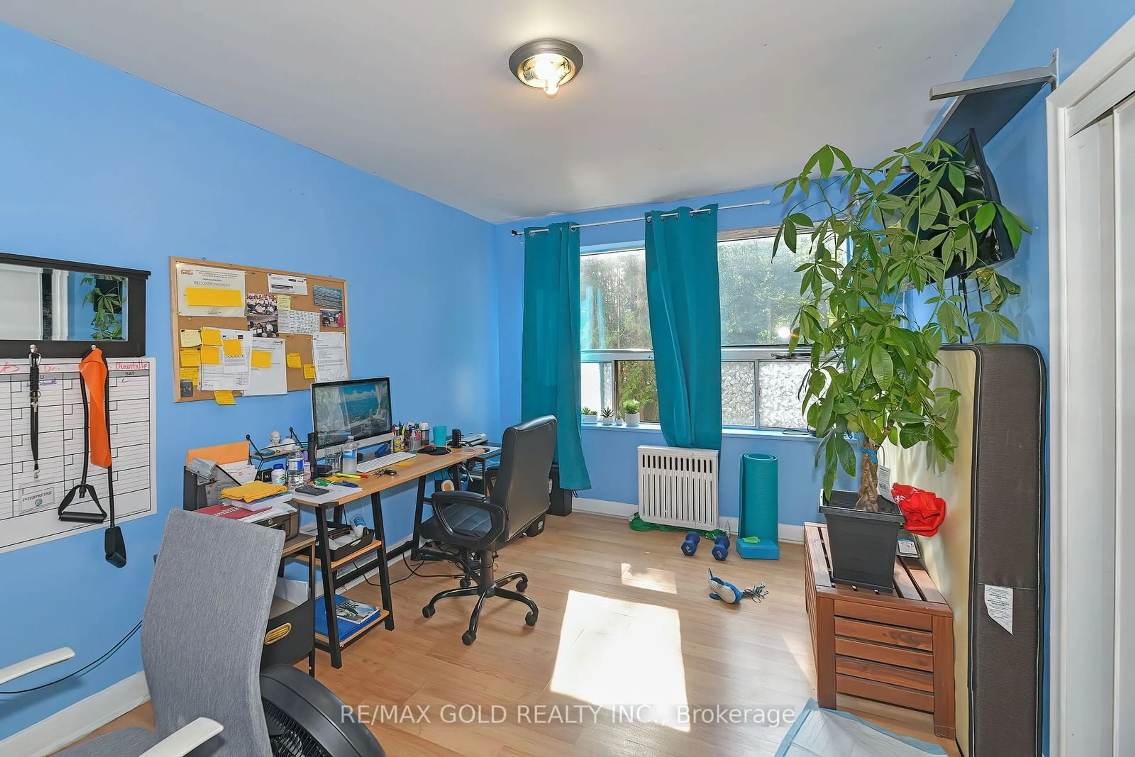 A pic of a room, wood floors for 156 Barrington Ave, Toronto Ontario M4C 4Z2