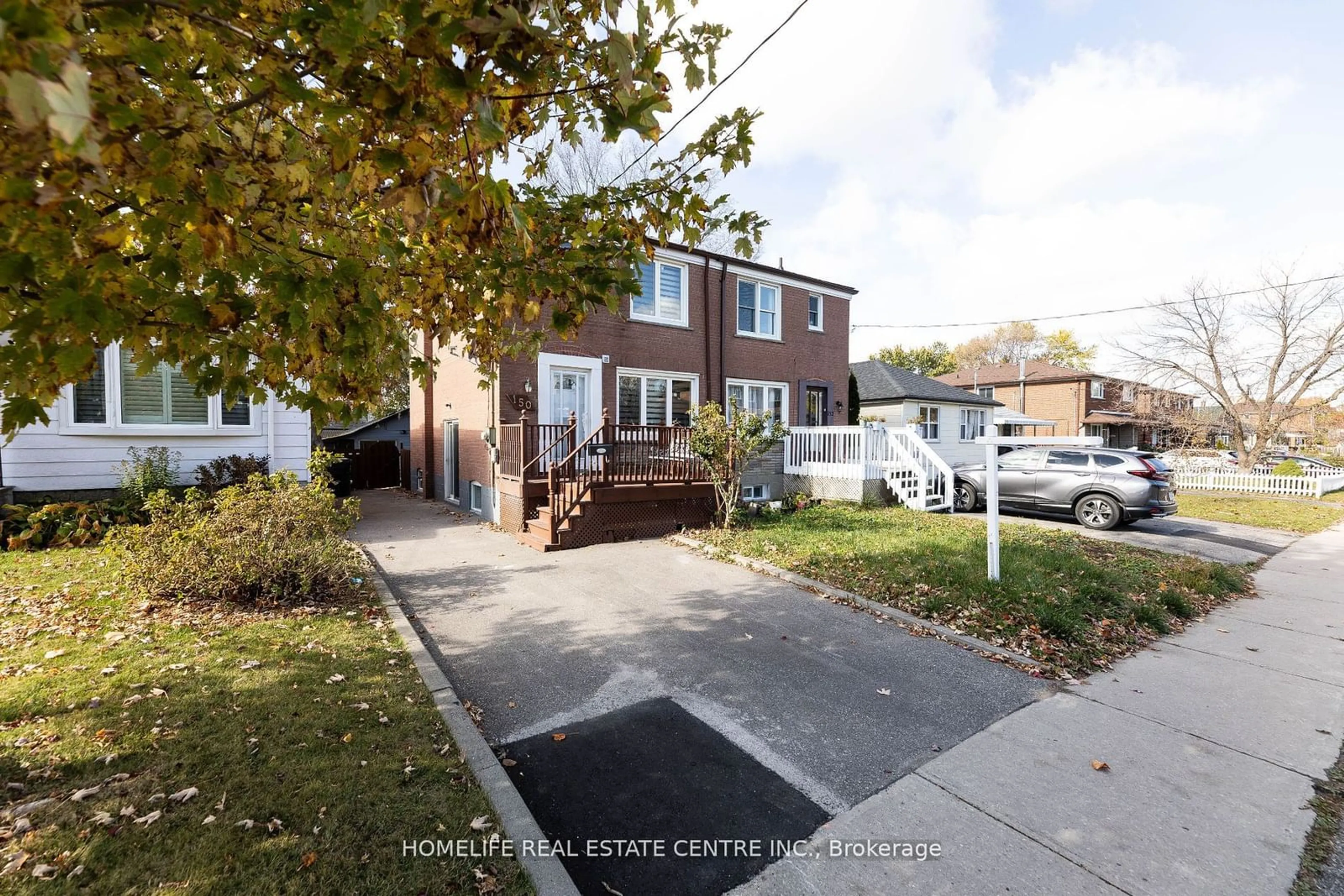 A pic from exterior of the house or condo, the street view for 150 Magnolia Ave, Toronto Ontario M1K 3K8