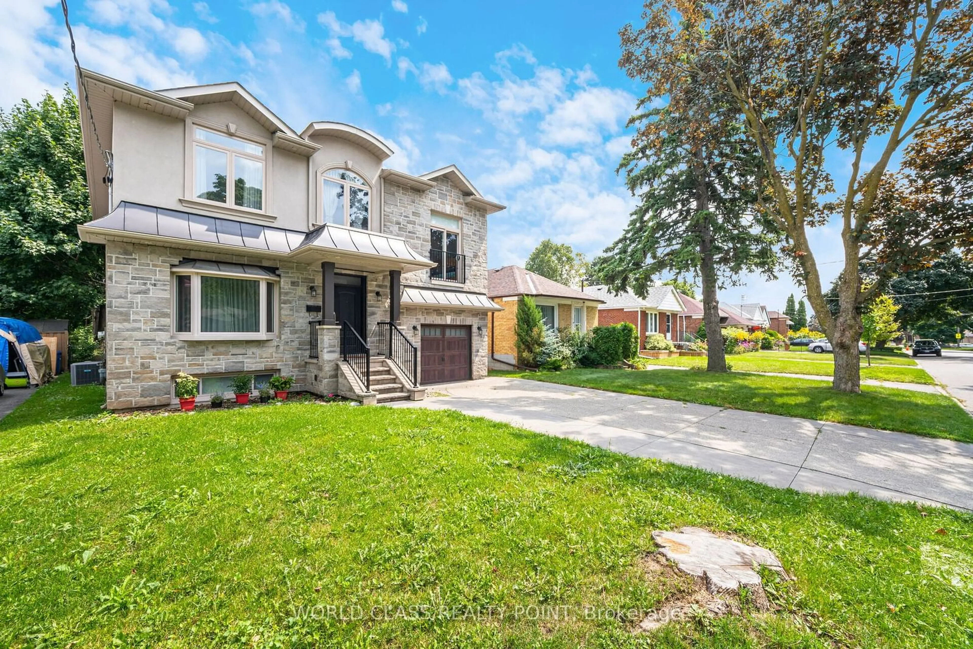 Frontside or backside of a home, the street view for 41 Howarth Ave, Toronto Ontario M1R 1H3