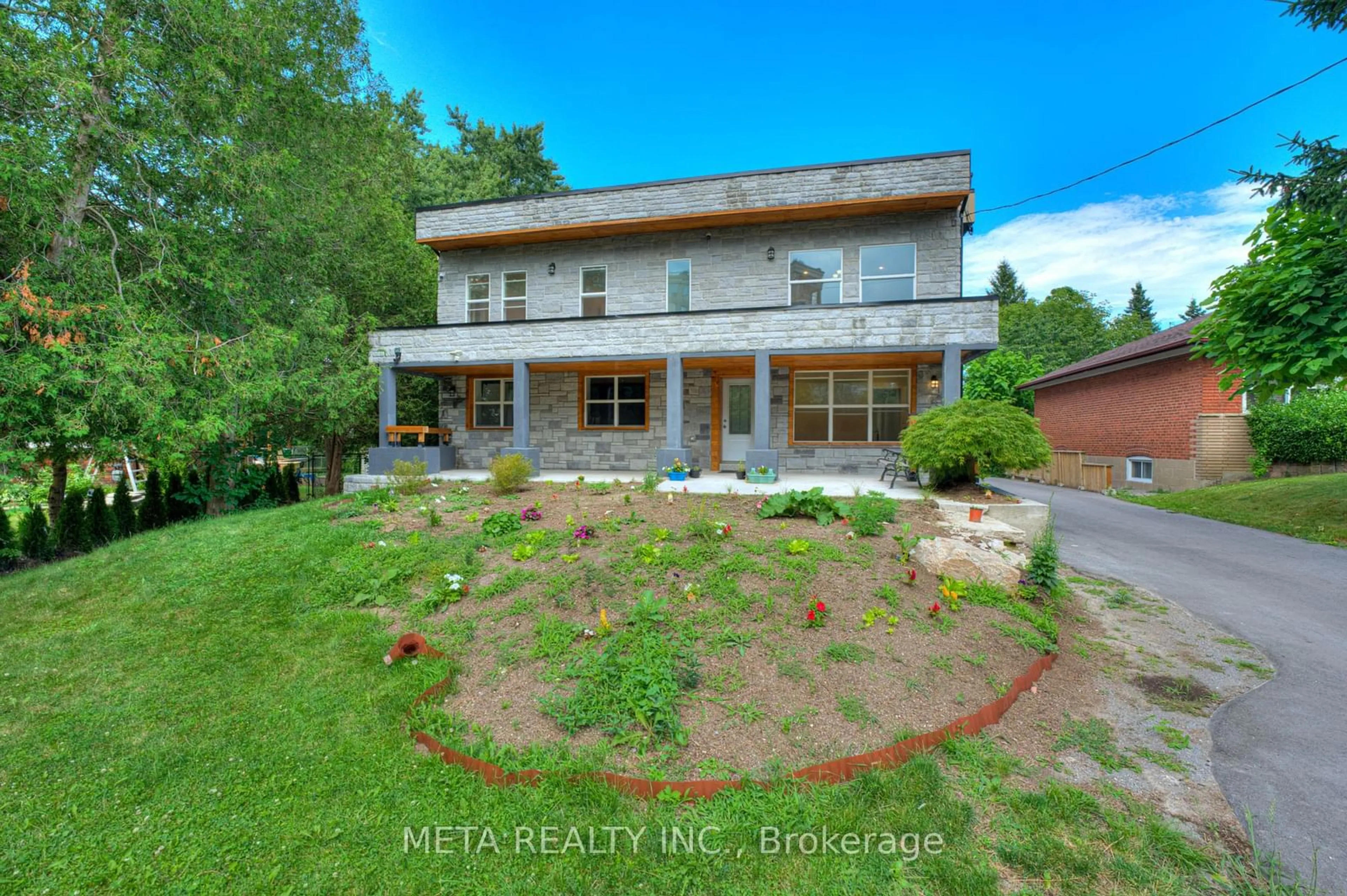 A pic from exterior of the house or condo, the fenced backyard for 35 Duncombe Blvd, Toronto Ontario M1M 3A4