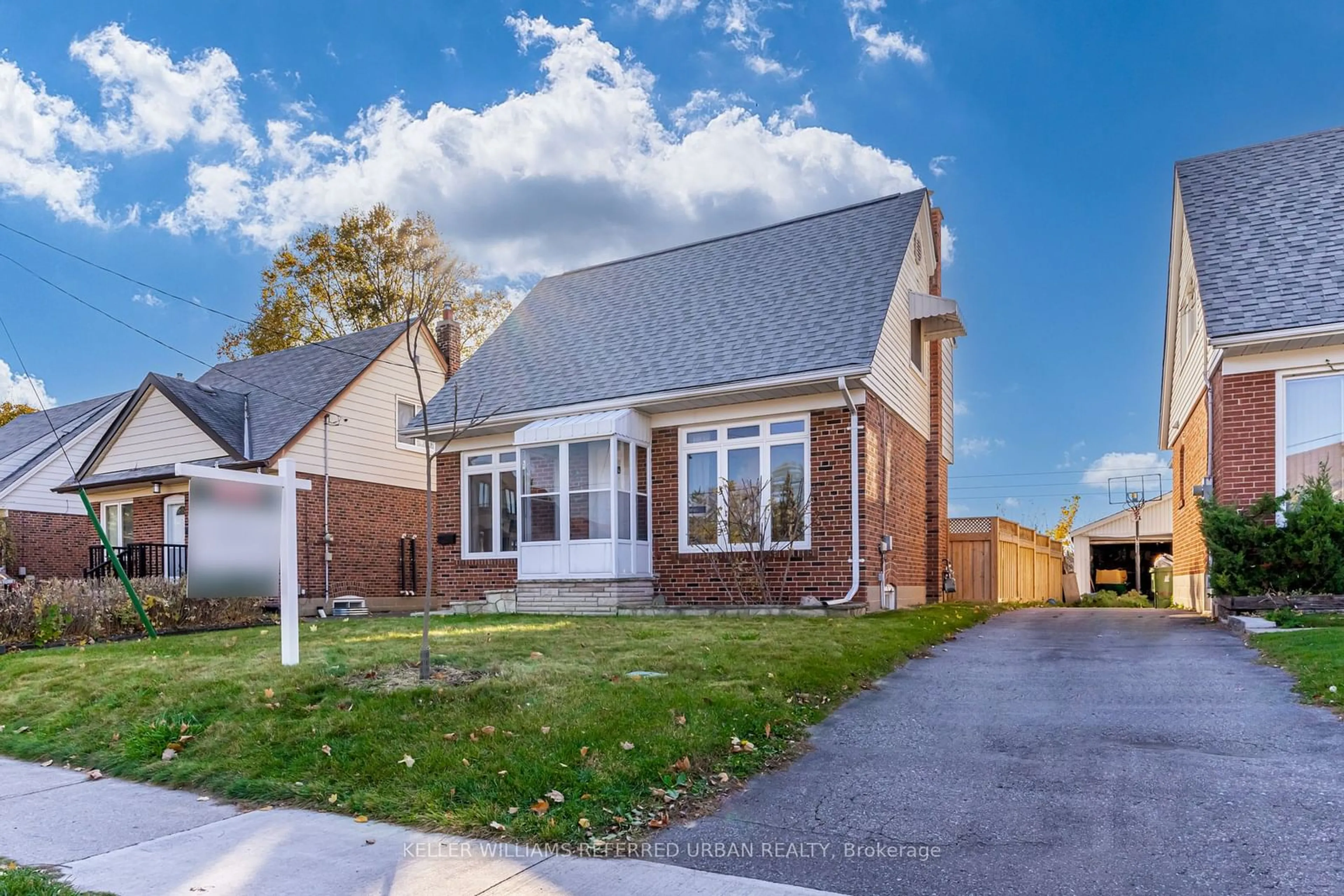 Frontside or backside of a home, the fenced backyard for 88 Tower Dr, Toronto Ontario M1R 3P2