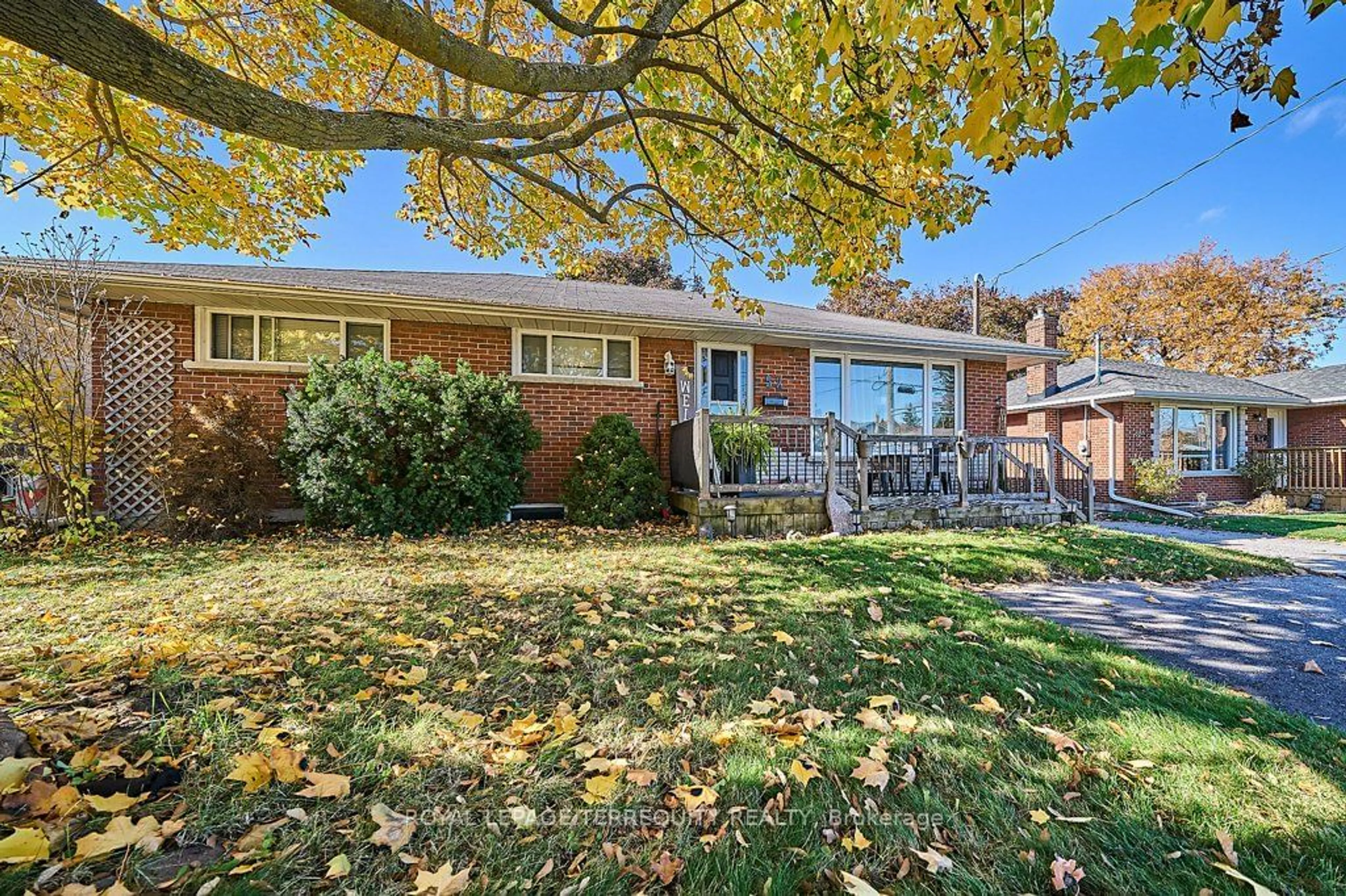 A pic from exterior of the house or condo, the fenced backyard for 52 Athabasca St, Oshawa Ontario L1H 7H6