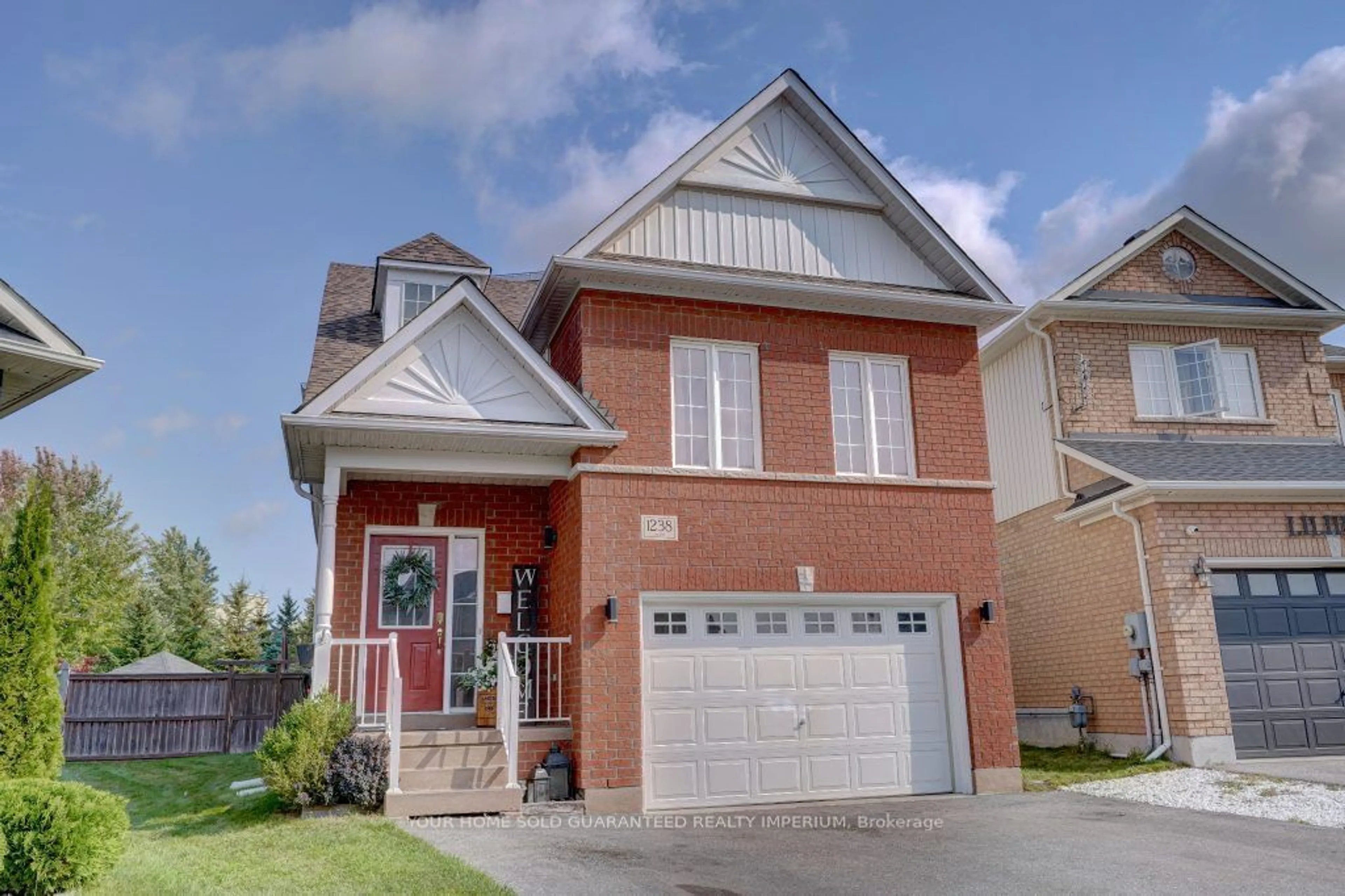 A pic from exterior of the house or condo, the street view for 1238 Macinally Crt, Oshawa Ontario L1K 0B6