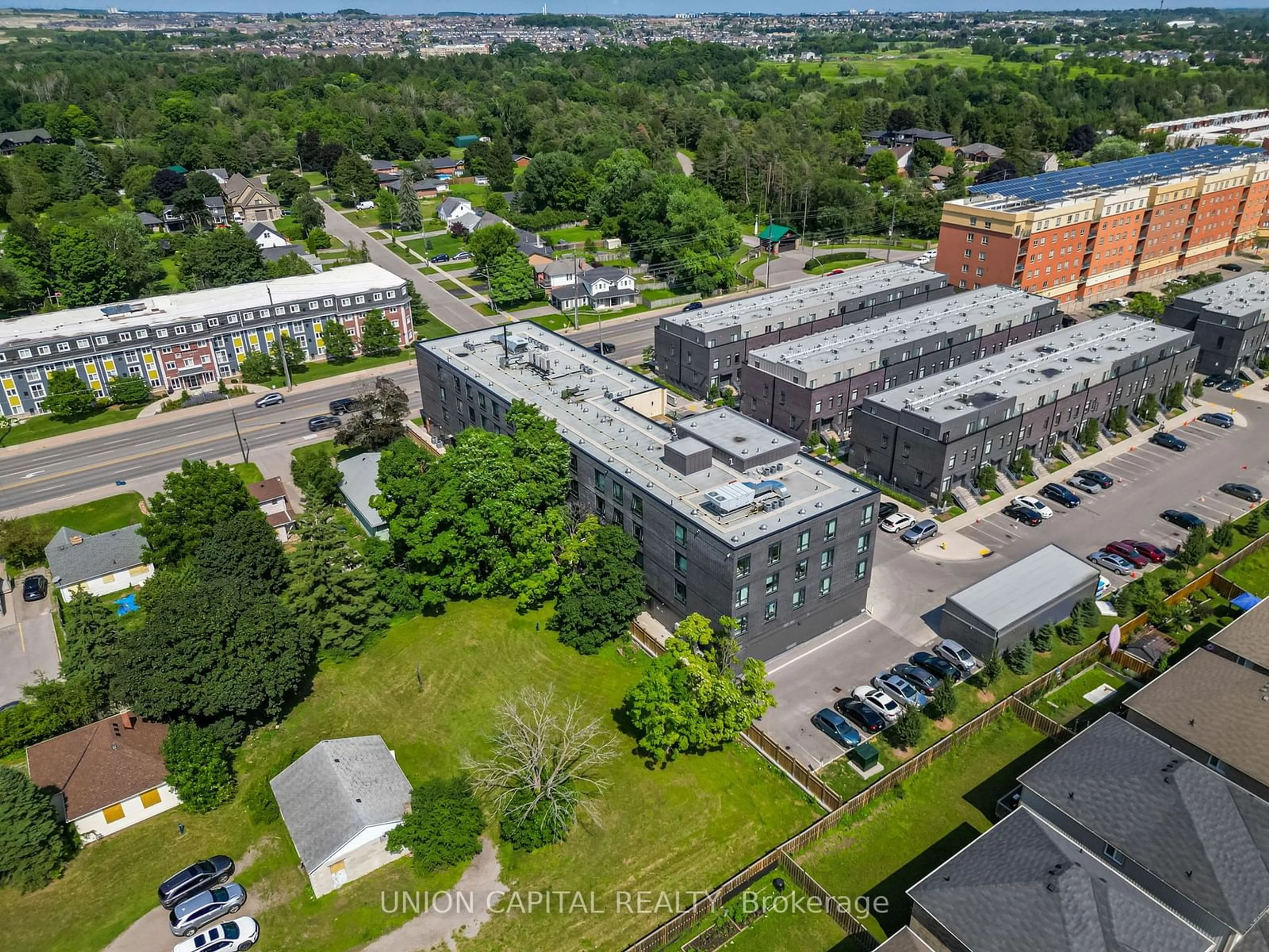 A pic from exterior of the house or condo, the street view for 1800 Simcoe St #301, Oshawa Ontario L1G 0C2