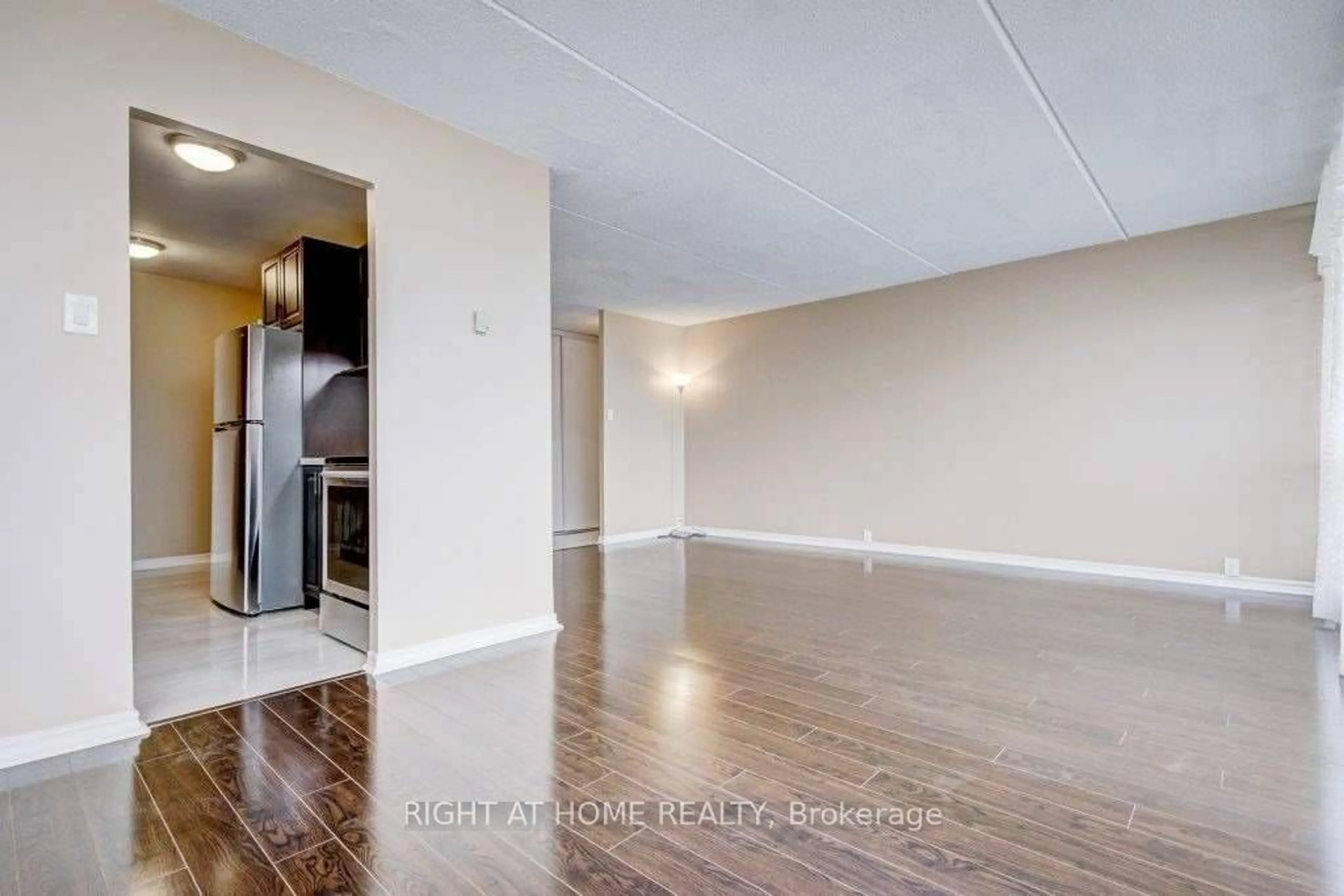 A pic of a room, wood floors for 2 Glamorgan Ave #1006, Toronto Ontario M1P 2M8