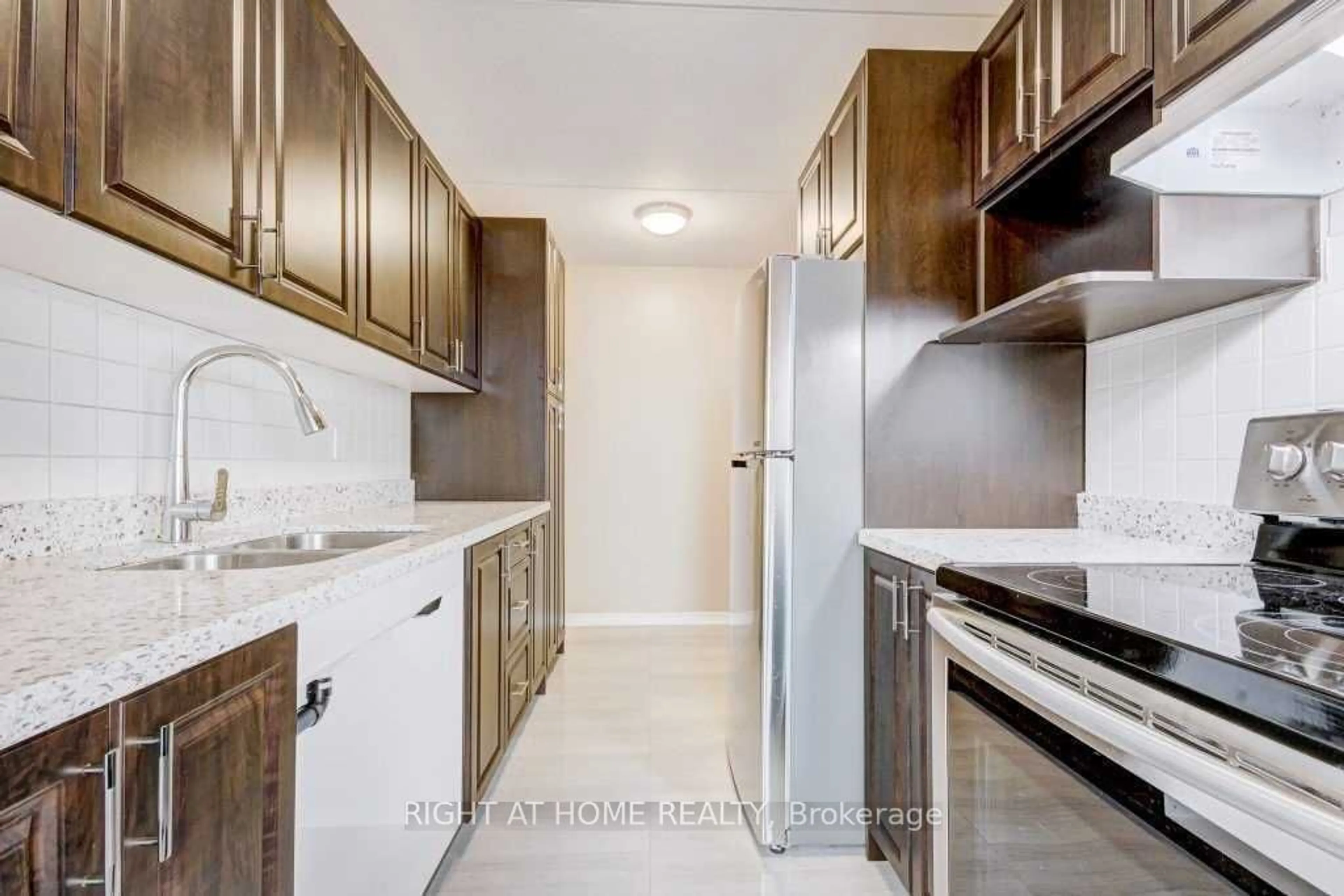 Standard kitchen, wood floors for 2 Glamorgan Ave #1006, Toronto Ontario M1P 2M8