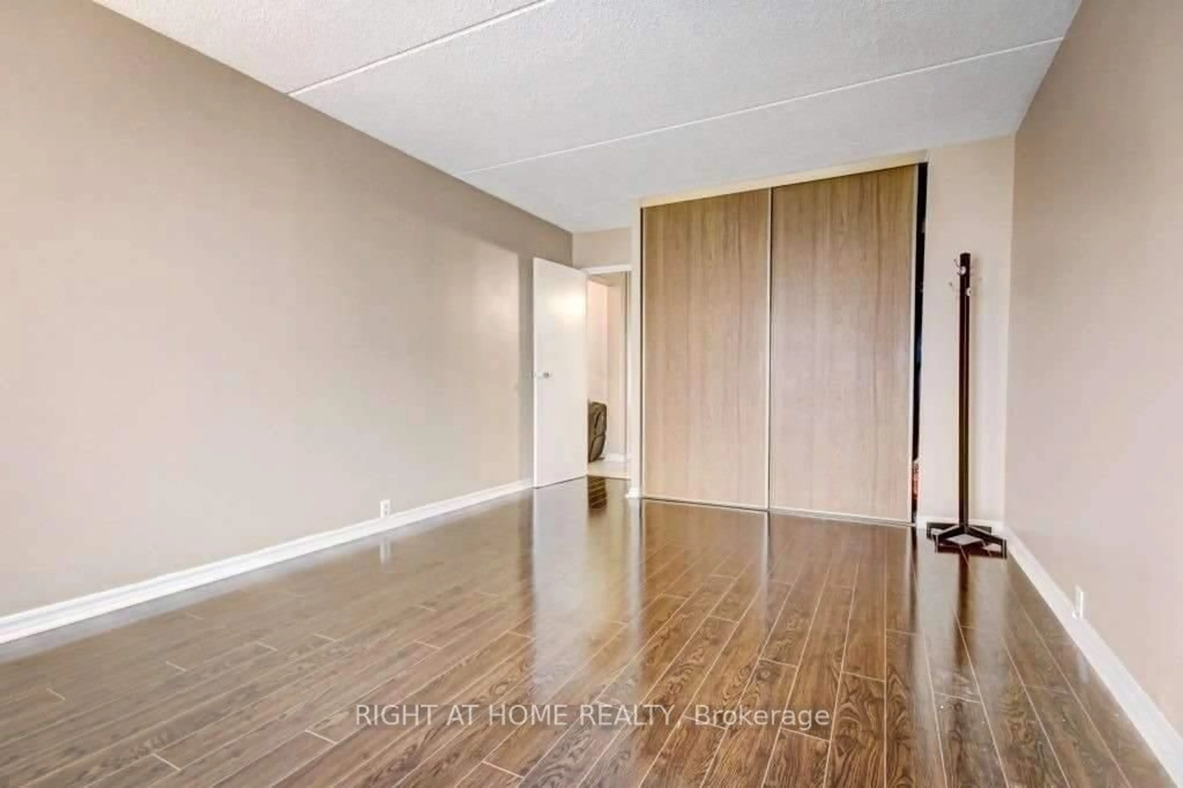 A pic of a room, wood floors for 2 Glamorgan Ave #1006, Toronto Ontario M1P 2M8