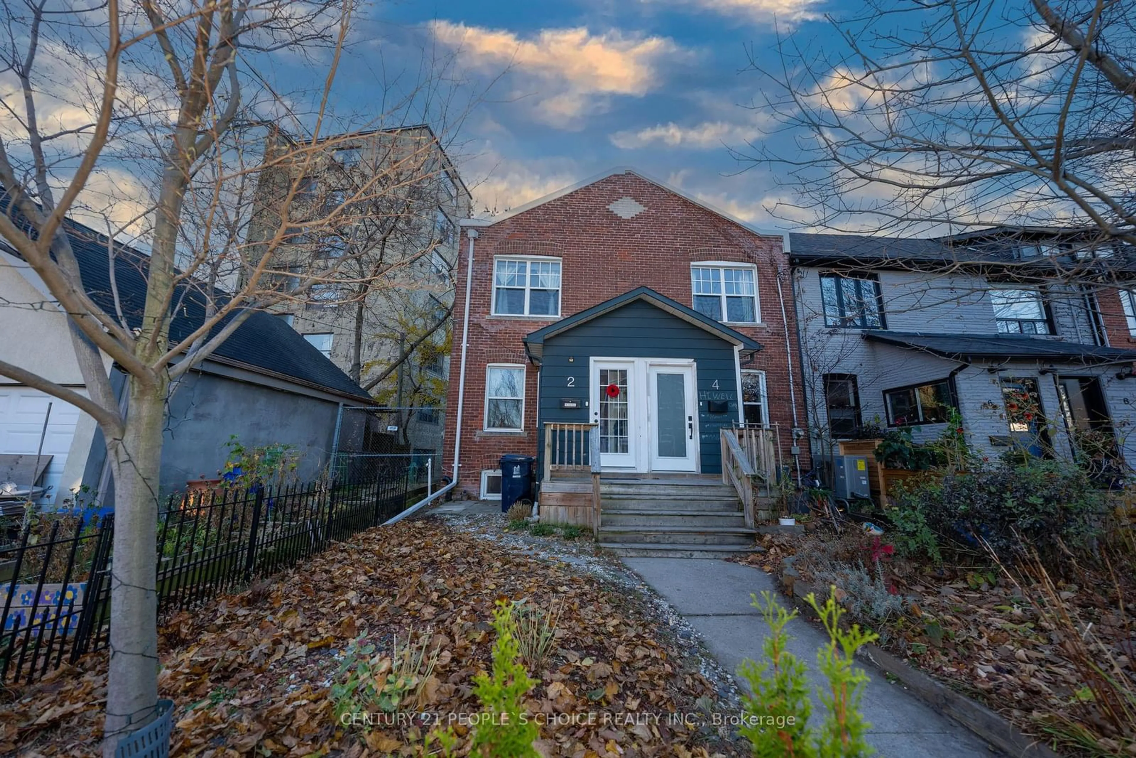 A pic from exterior of the house or condo, the street view for 2 Hannaford St, Toronto Ontario M4E 3G7