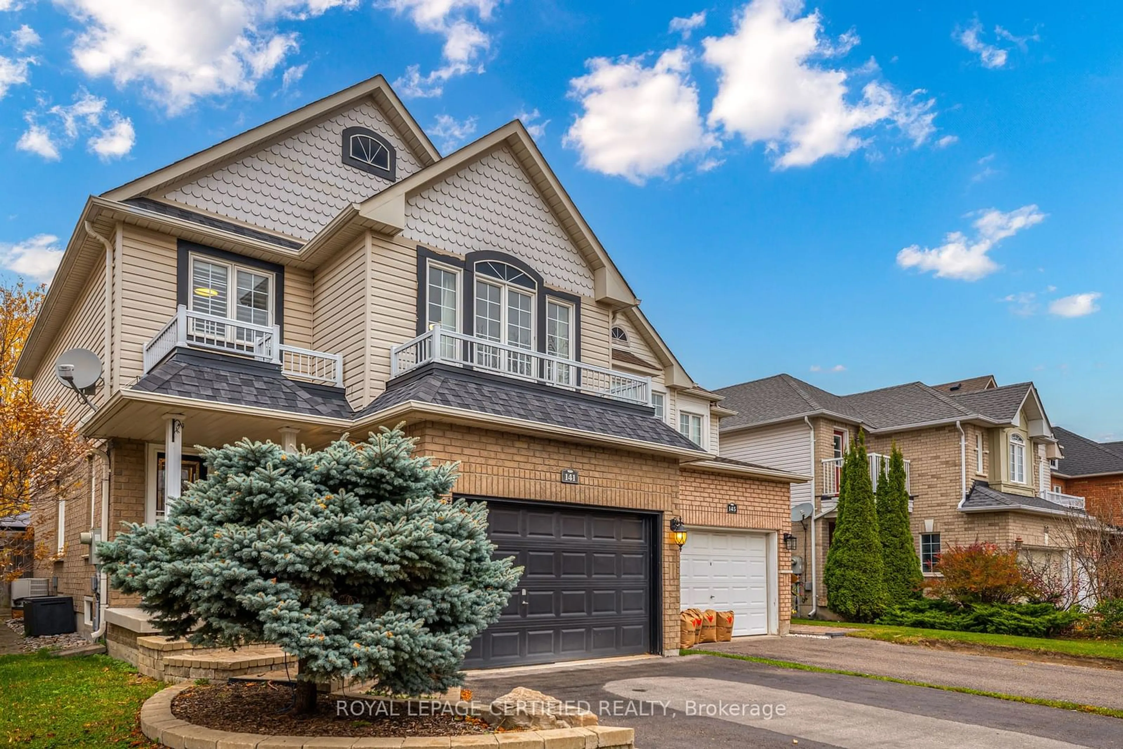 Frontside or backside of a home, the street view for 141 Madden Pl, Clarington Ontario L1C 5K4