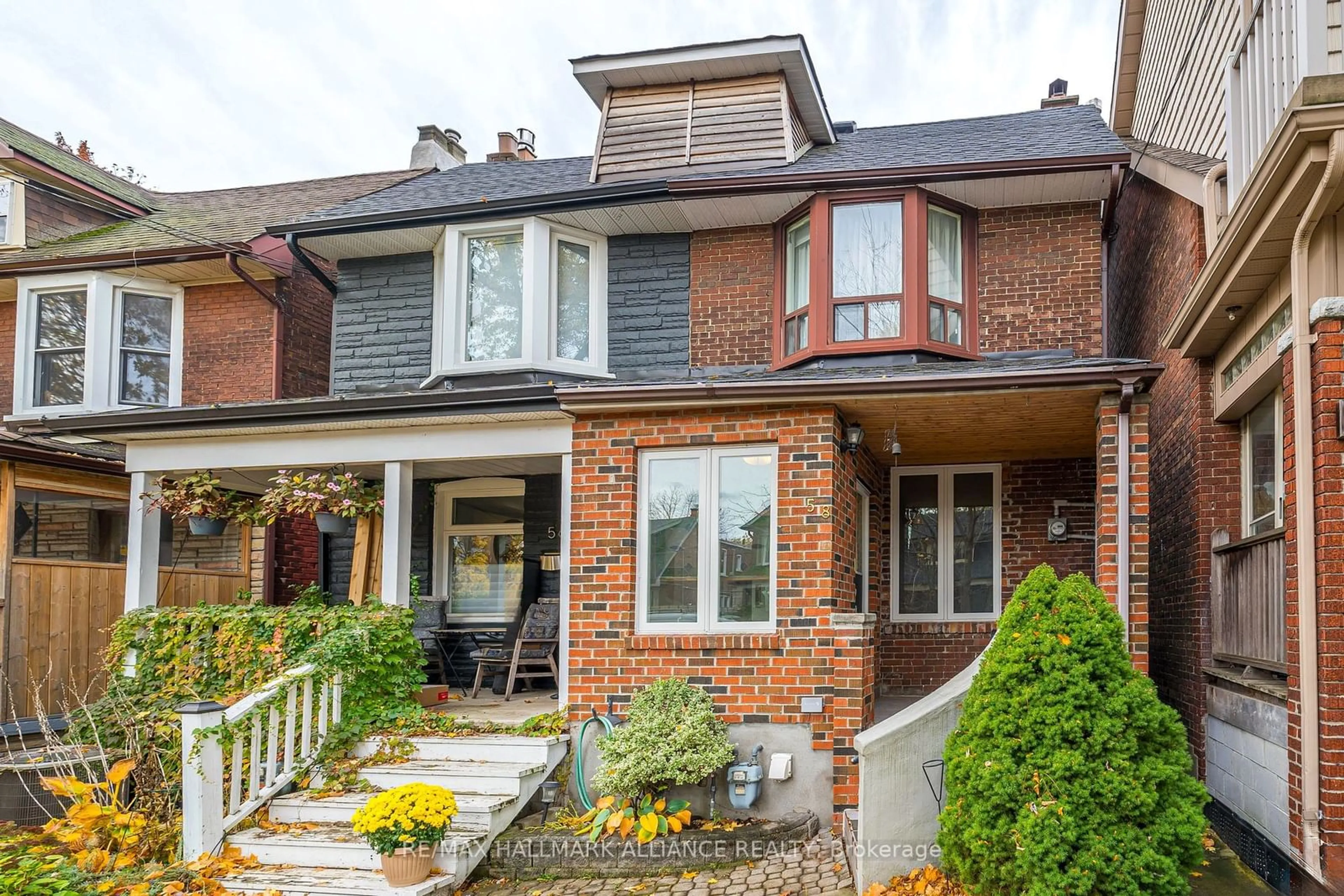 Home with brick exterior material for 58 Monarch Park Ave, Toronto Ontario M4J 4P8