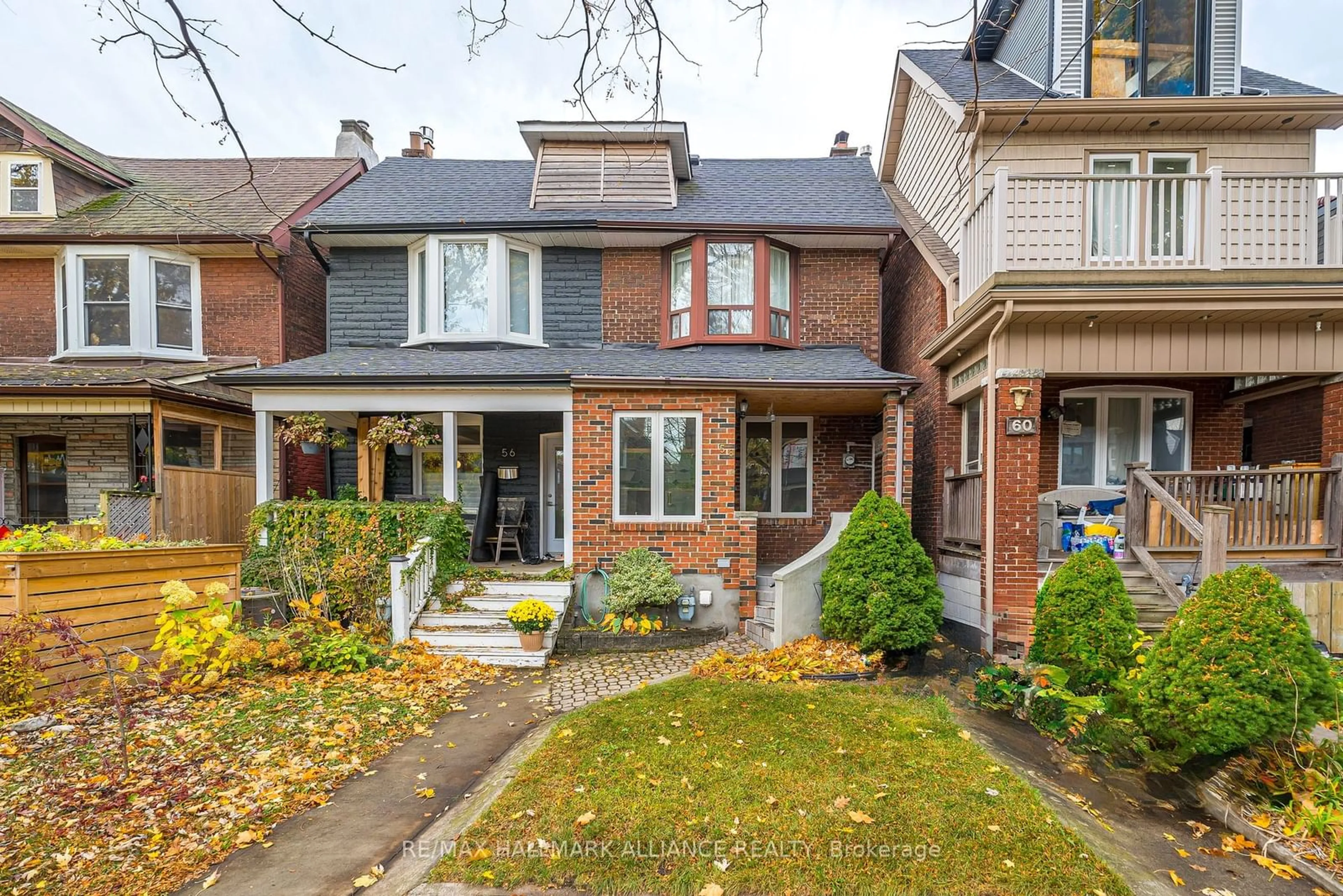 Home with brick exterior material for 58 Monarch Park Ave, Toronto Ontario M4J 4P8