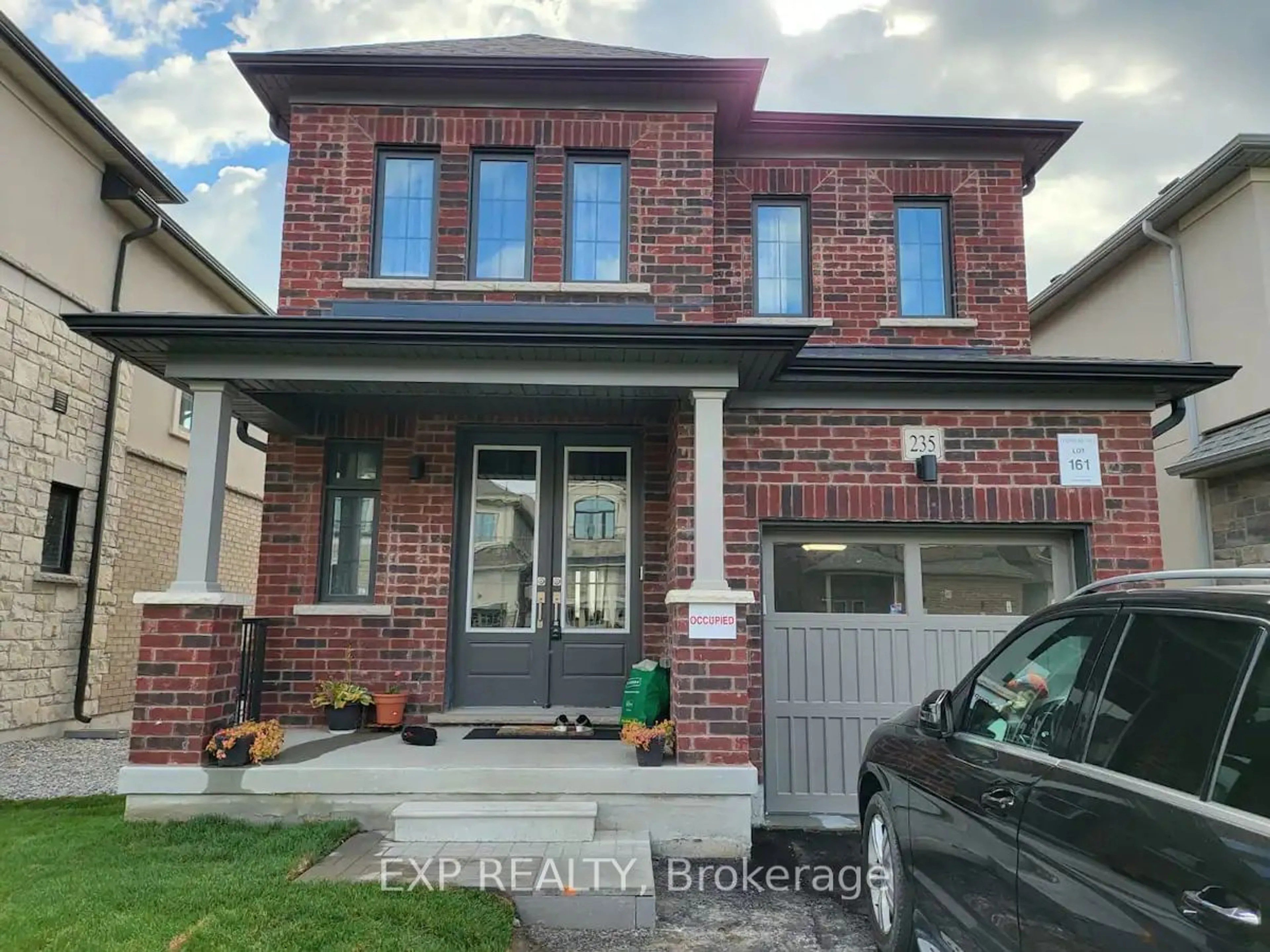 Home with brick exterior material for 235 Flood Ave, Clarington Ontario L1B 1L9