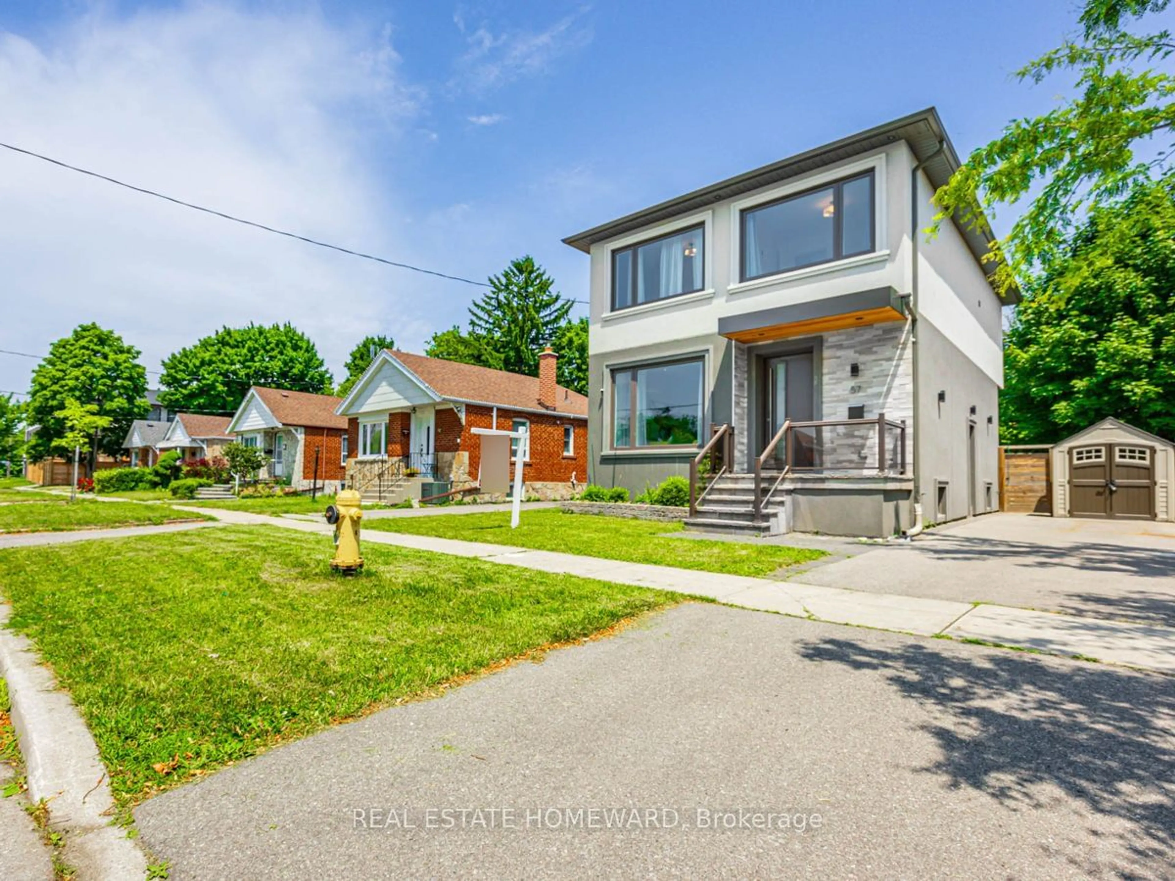 Frontside or backside of a home, the street view for 57 Marsh Rd, Toronto Ontario M1K 1Z1