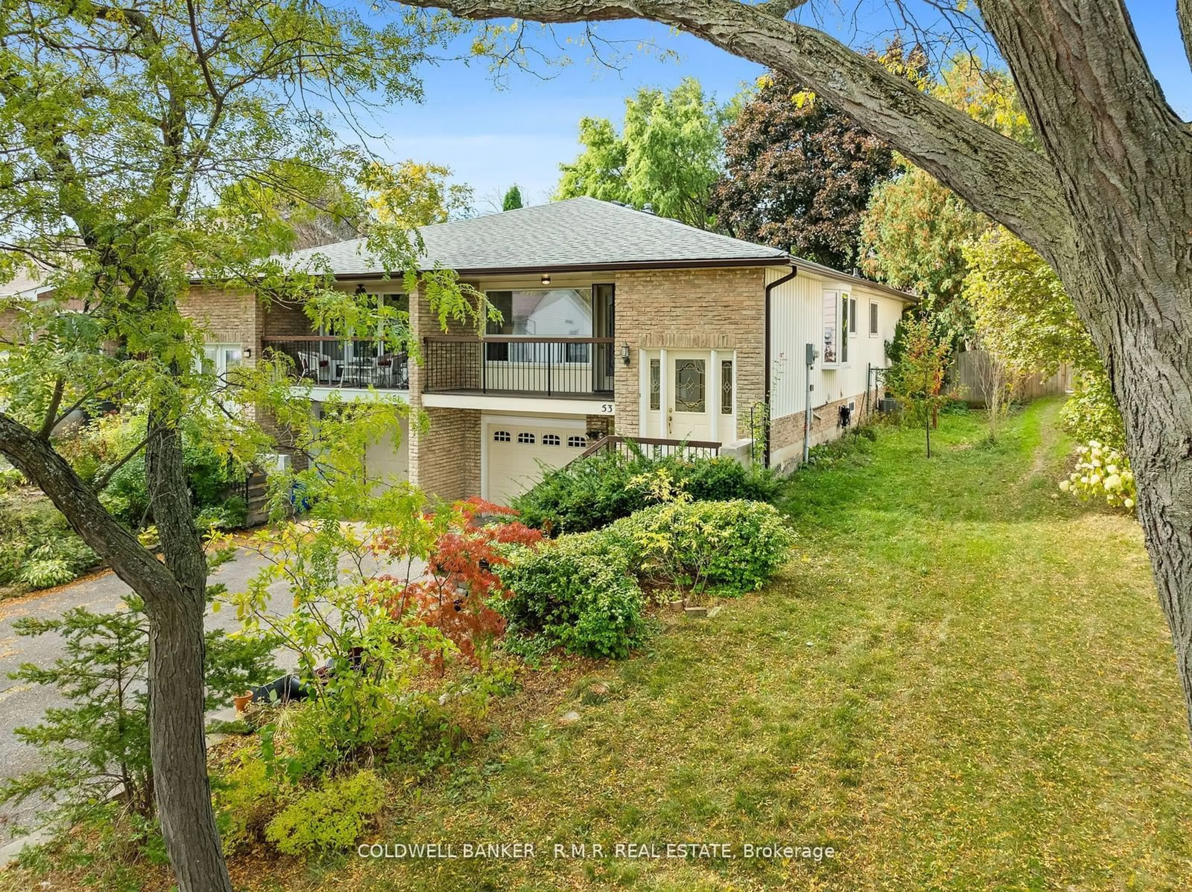 Frontside or backside of a home, the fenced backyard for 53 Guthrie Cres, Whitby Ontario L1P 1A6