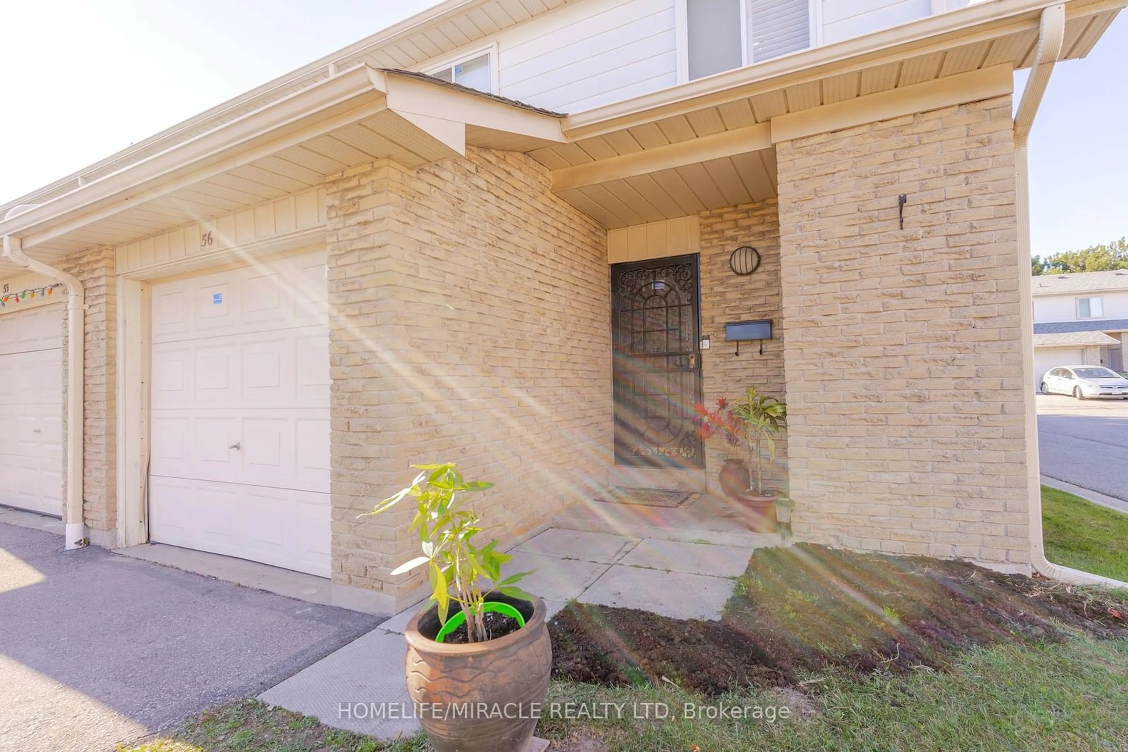 A pic from exterior of the house or condo, the street view for 50 BLACKWELL Ave #56, Toronto Ontario M1B 1K2