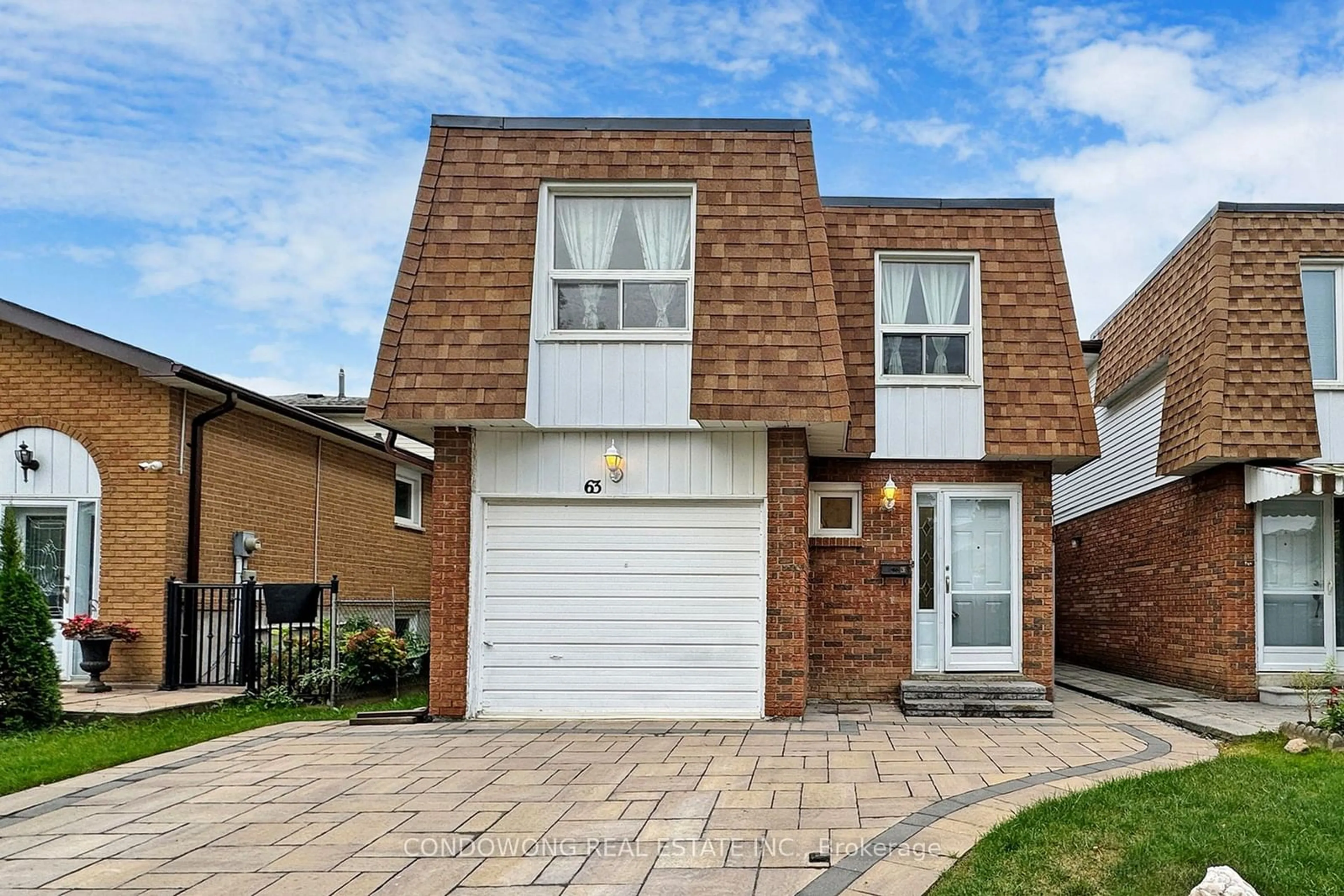 Home with brick exterior material for 63 Revlis Cres, Toronto Ontario M1V 1E8