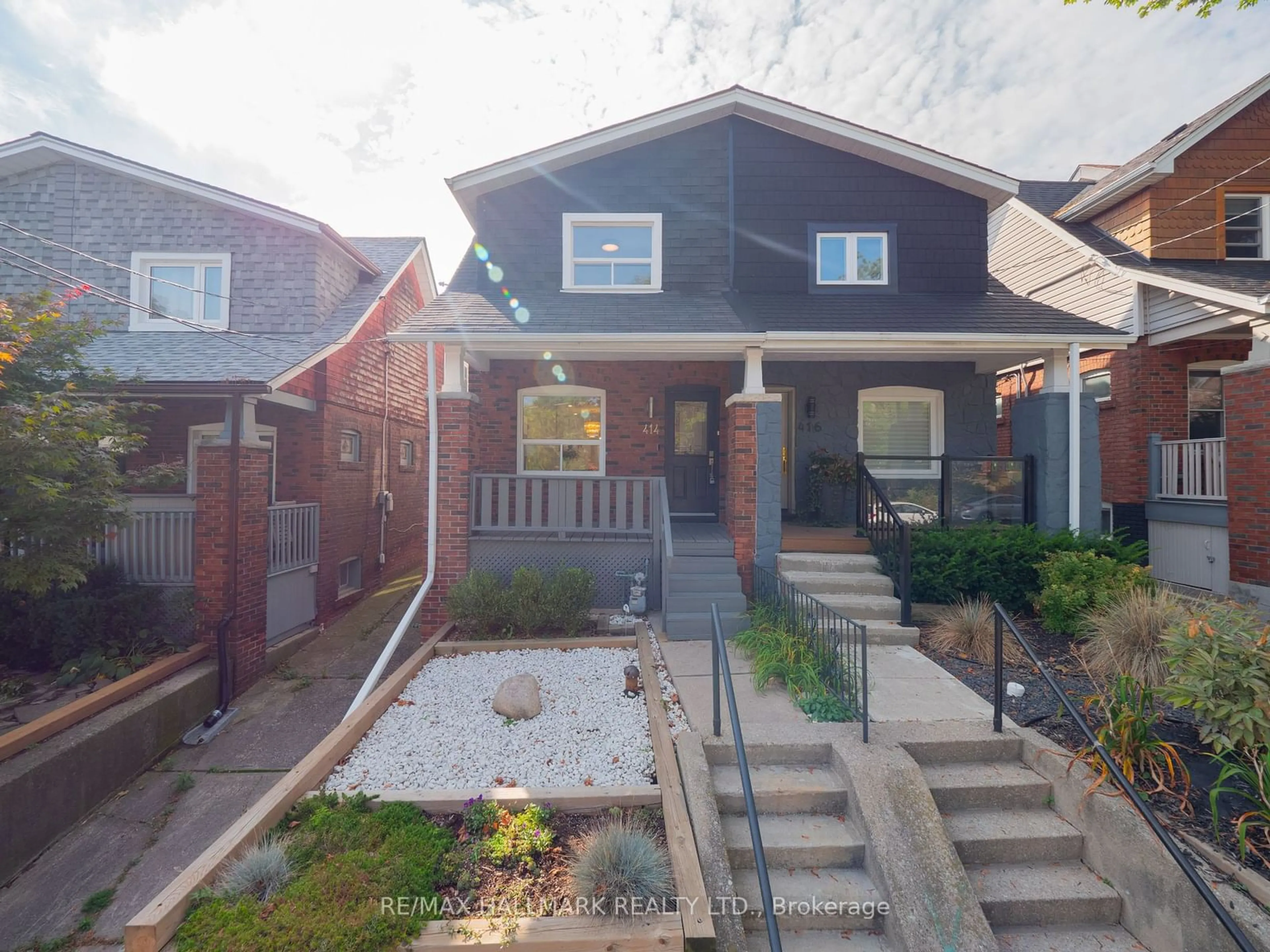 Frontside or backside of a home, the street view for 414 Jones Ave, Toronto Ontario M4J 3G3