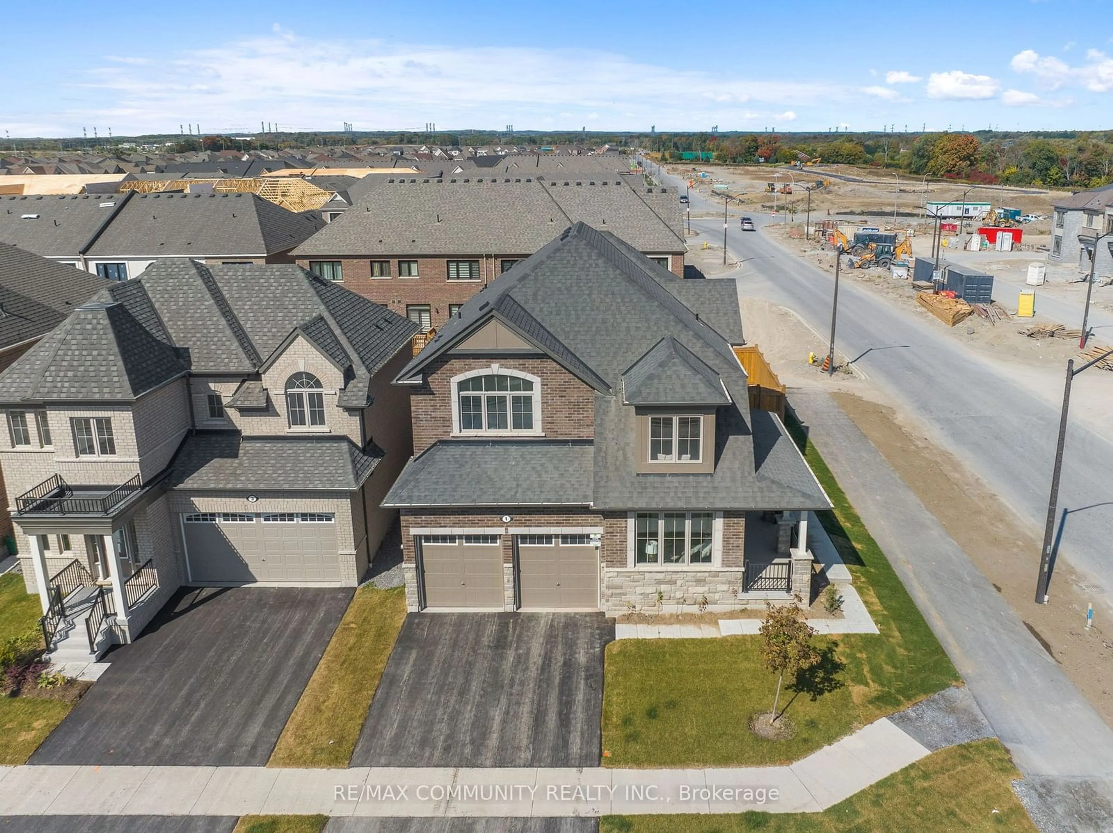 Frontside or backside of a home, the street view for 1 Olerud Dr, Whitby Ontario L1P 0J1