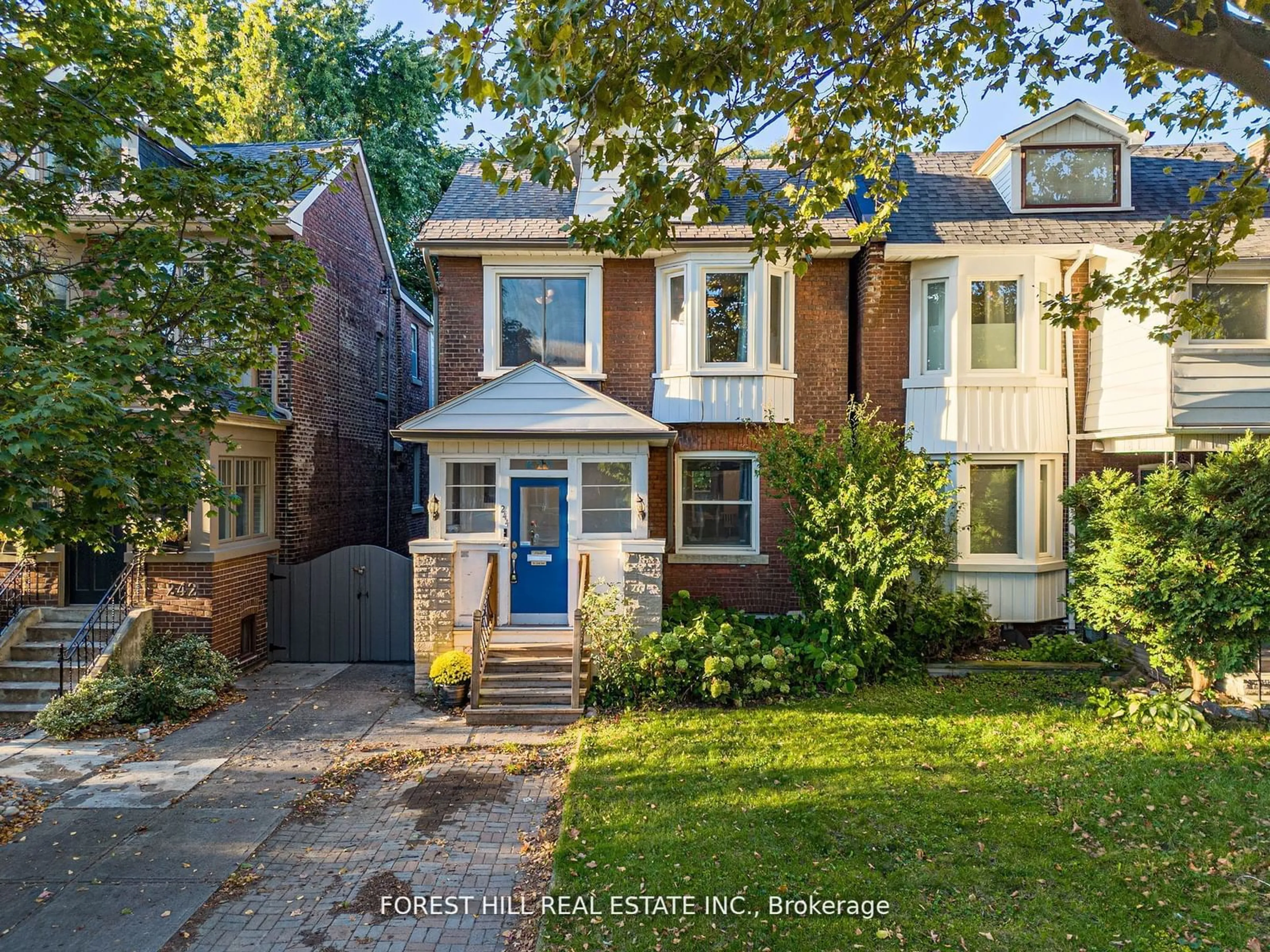 Frontside or backside of a home, the street view for 244 Strathmore Blvd, Toronto Ontario M4J 1P6