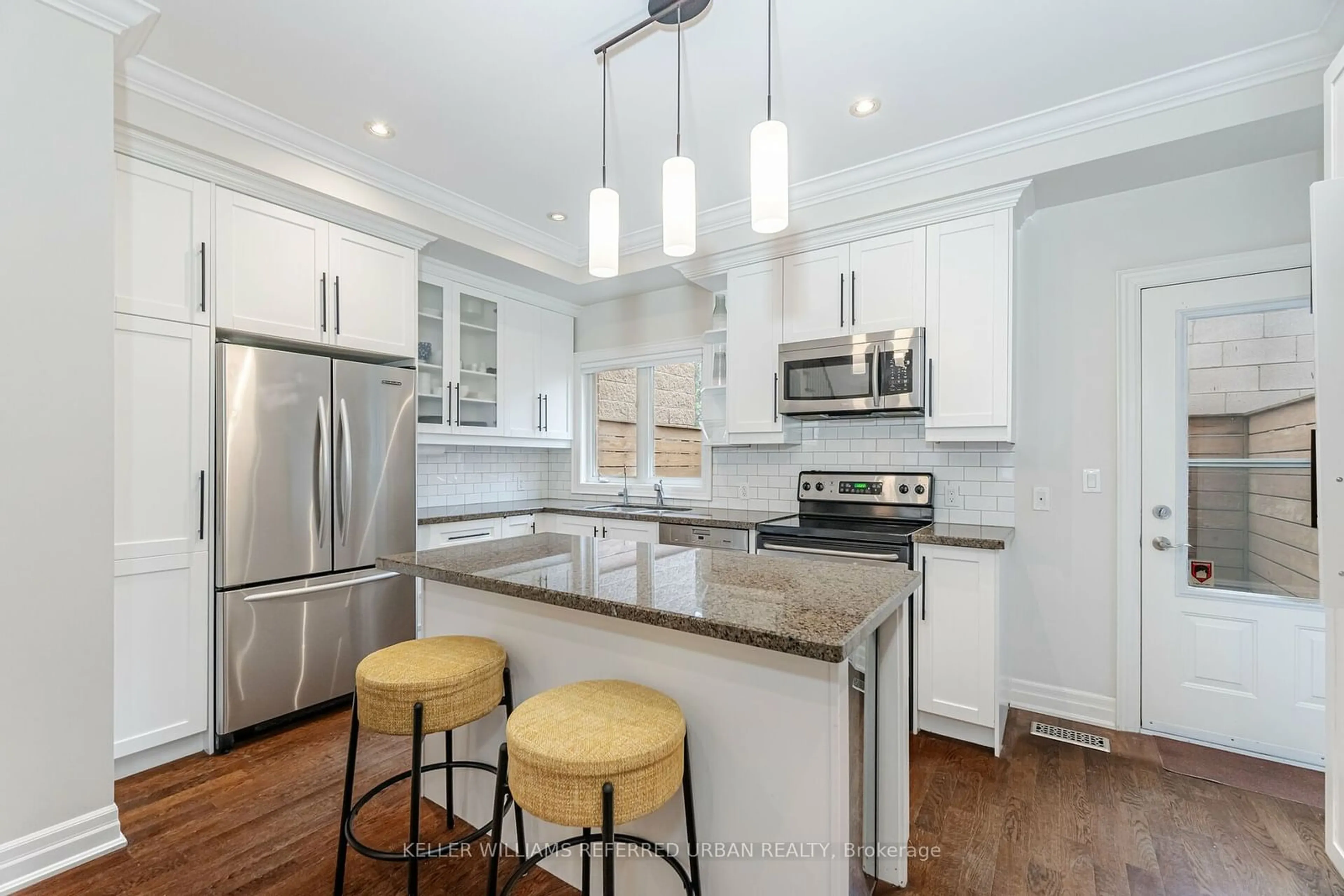 Open concept kitchen for 213 Heward Ave, Toronto Ontario M4M 2T6