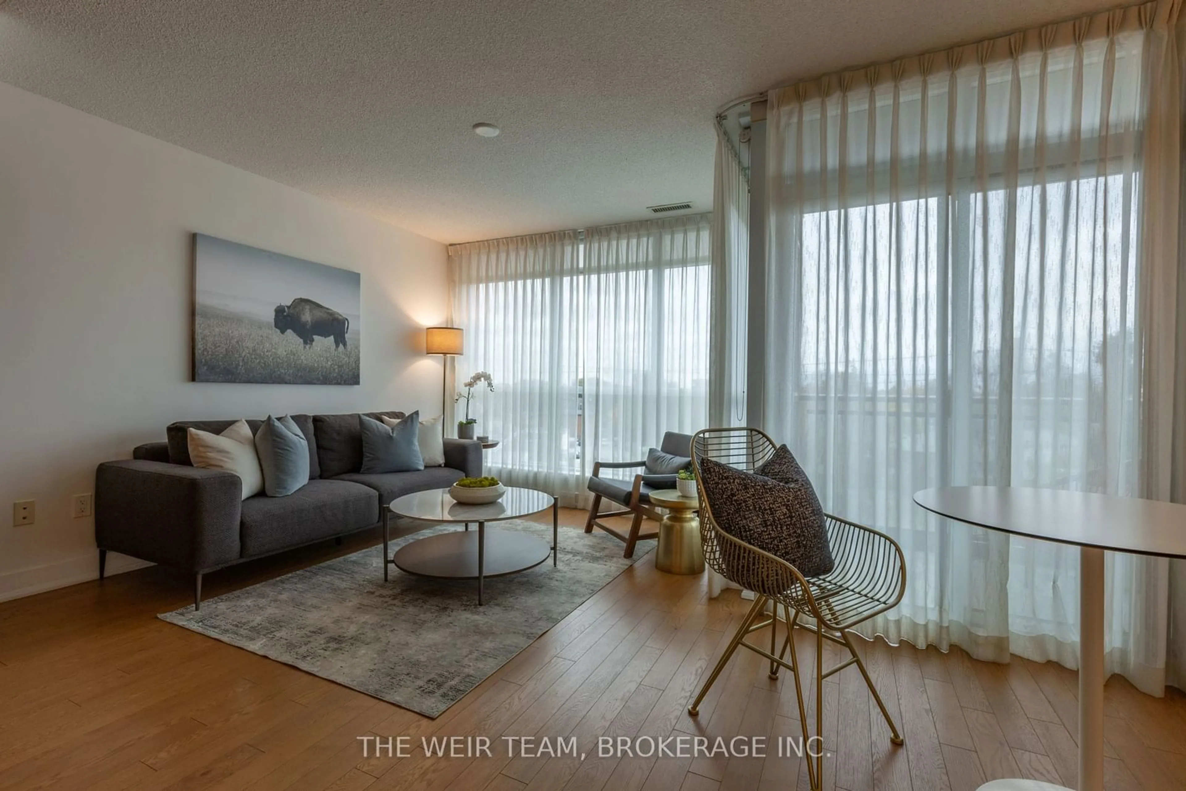 Living room, wood floors for 1048 Broadview Ave #505, Toronto Ontario M4K 2B8