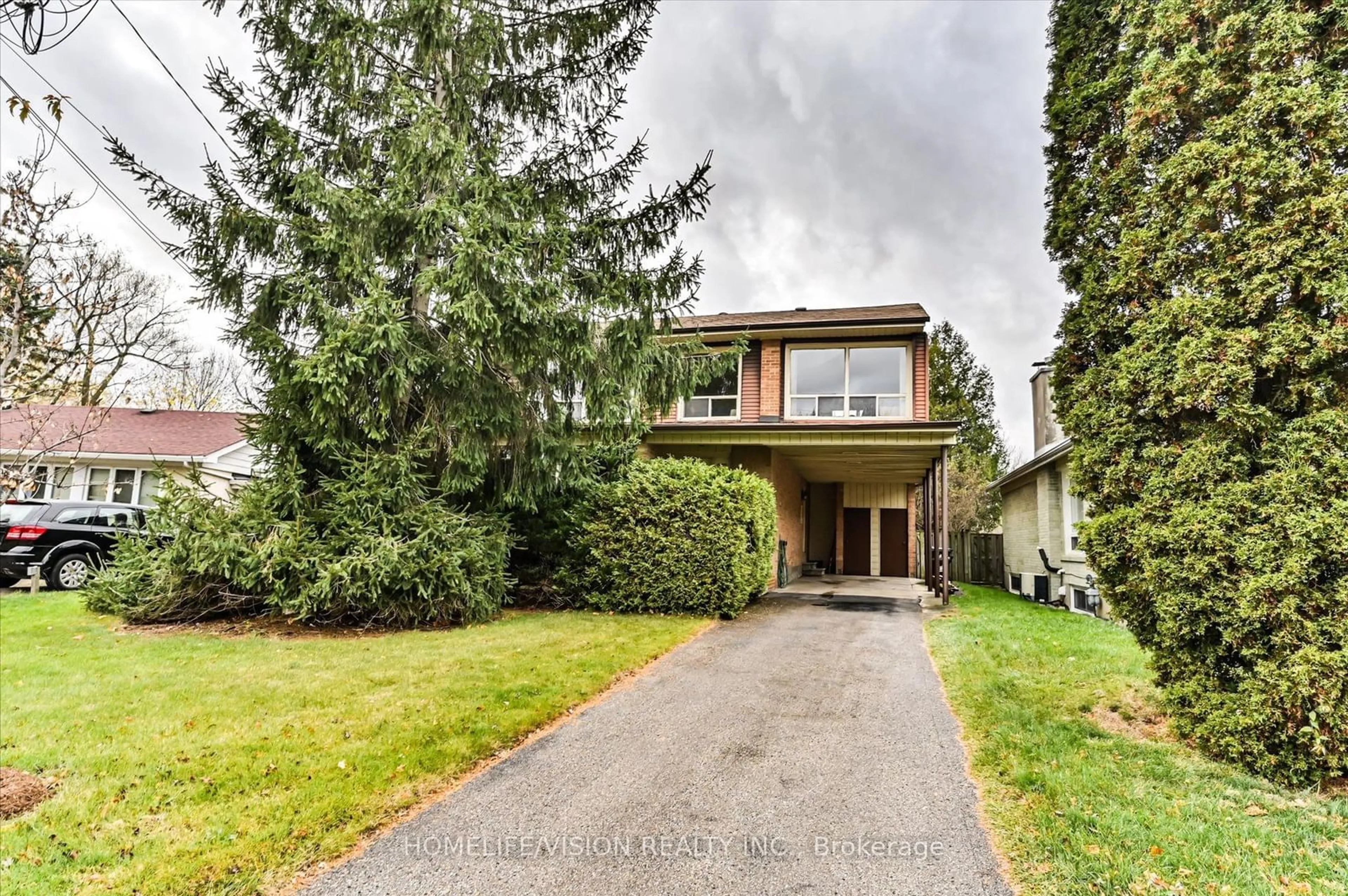 Frontside or backside of a home, the street view for 6 Haileybury Dr, Toronto Ontario M1K 4X5