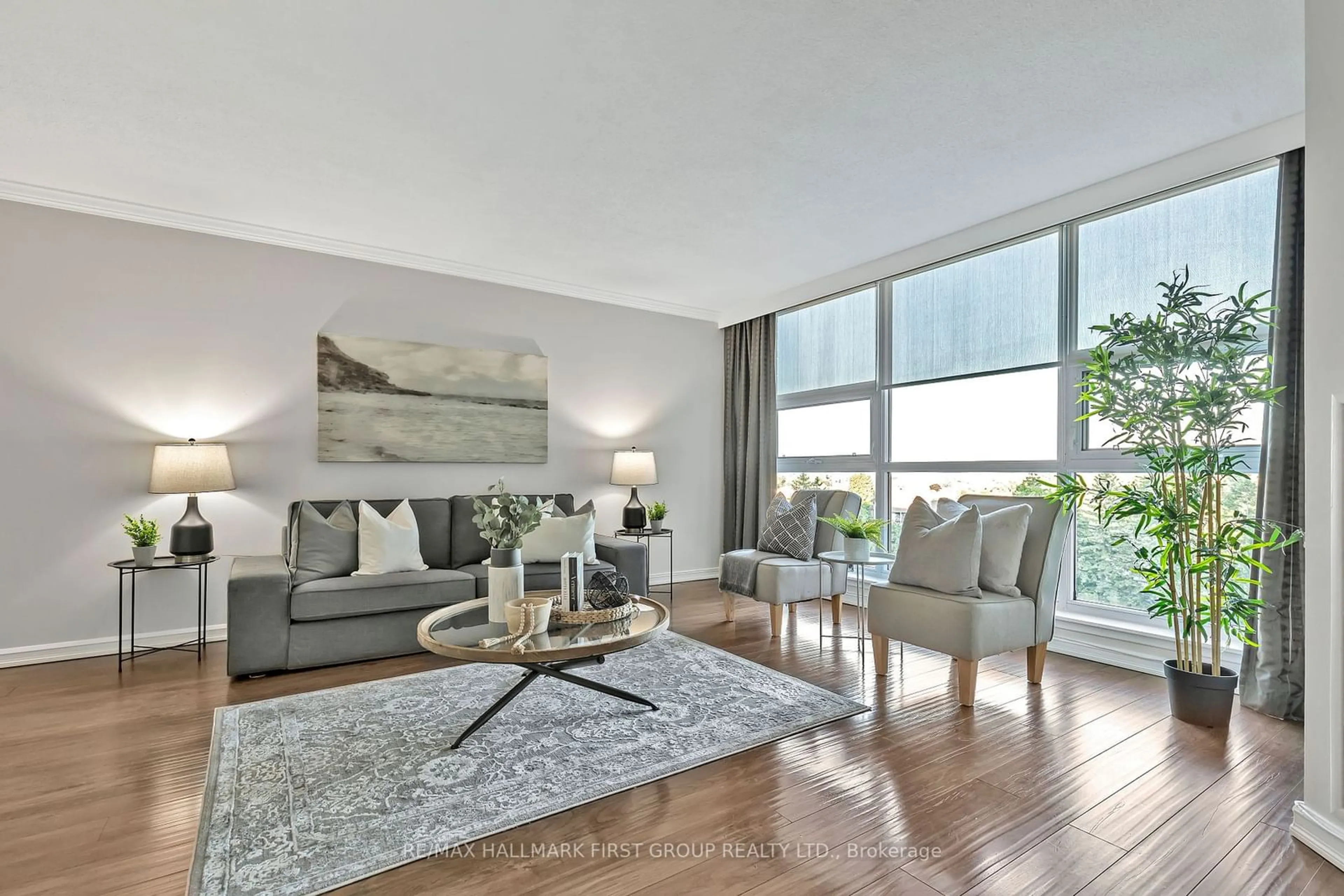 Living room, wood floors for 10 Dean Park Rd #610, Toronto Ontario M1B 3G8