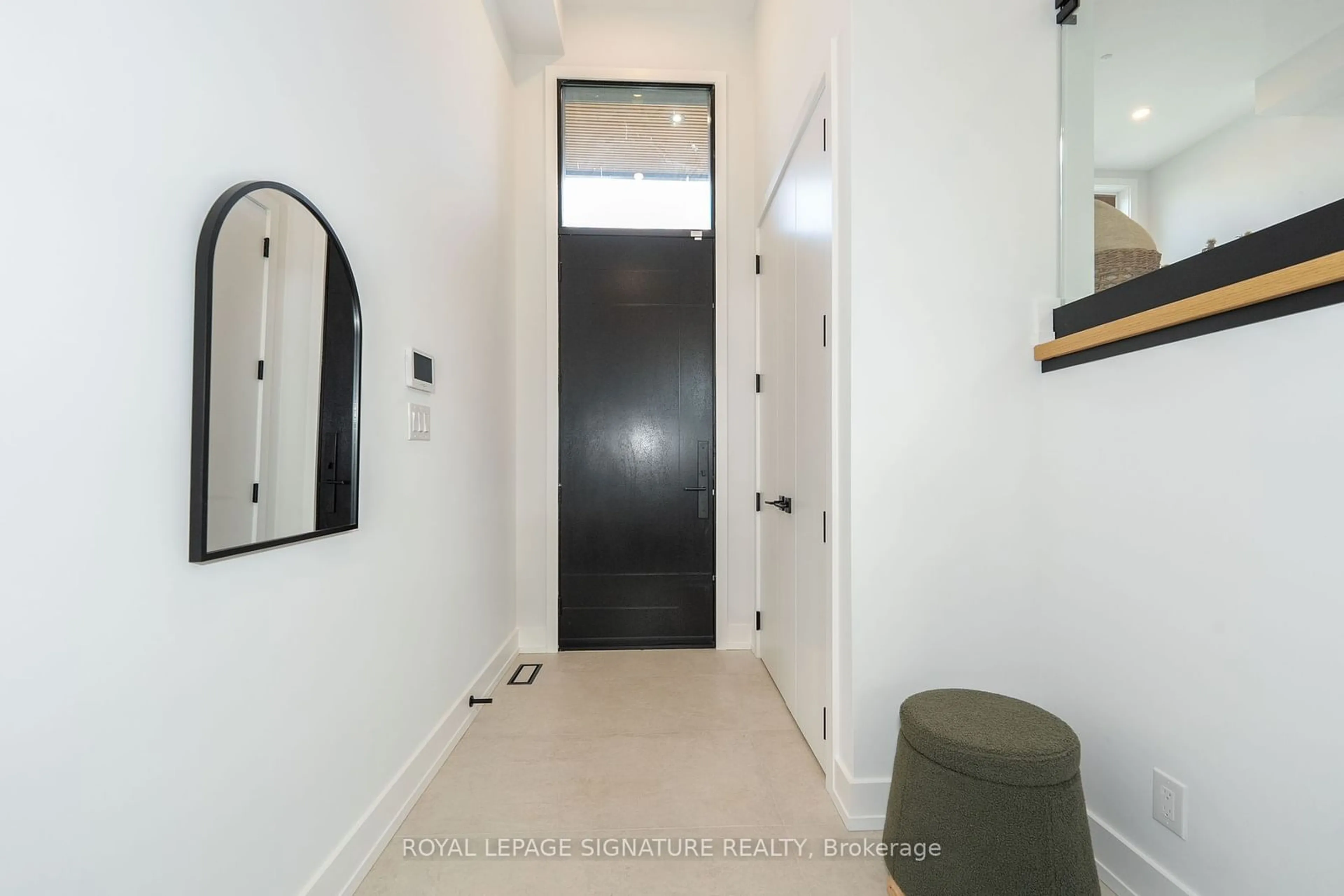 Indoor entryway, wood floors for 99 Yardley Ave, Toronto Ontario M4B 2A9