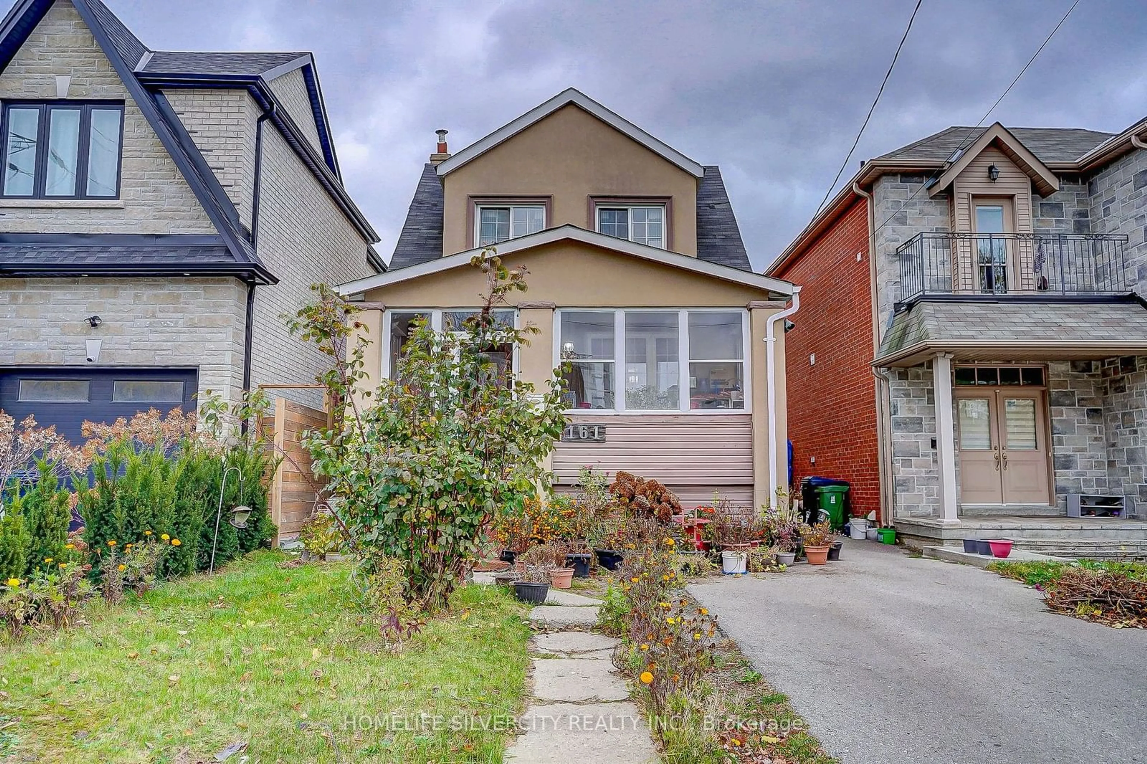 A pic from exterior of the house or condo, cottage for 161 August Ave, Toronto Ontario M1L 3N3