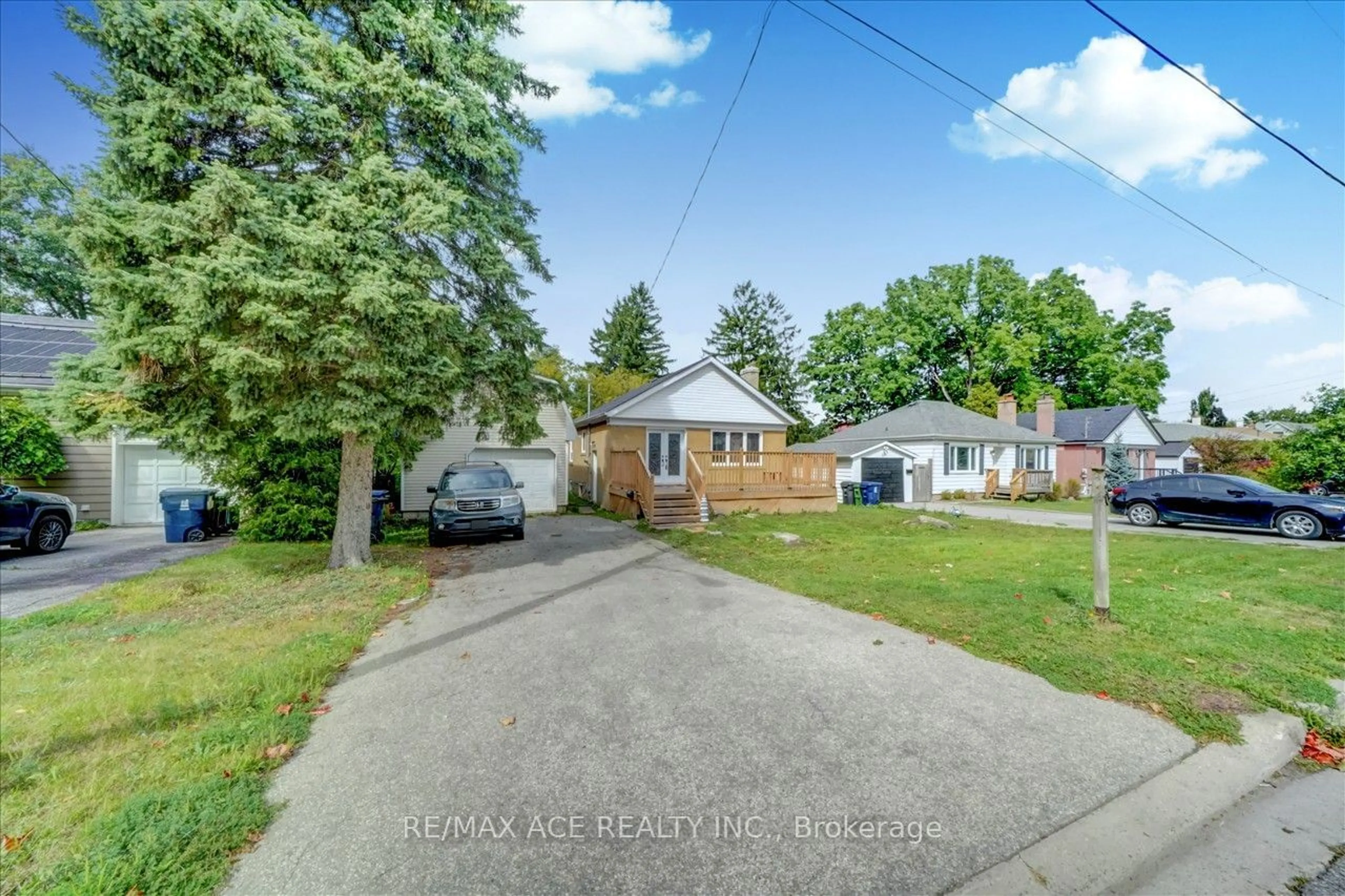 Frontside or backside of a home, the street view for 20 Martindale Rd, Toronto Ontario M1M 2B7