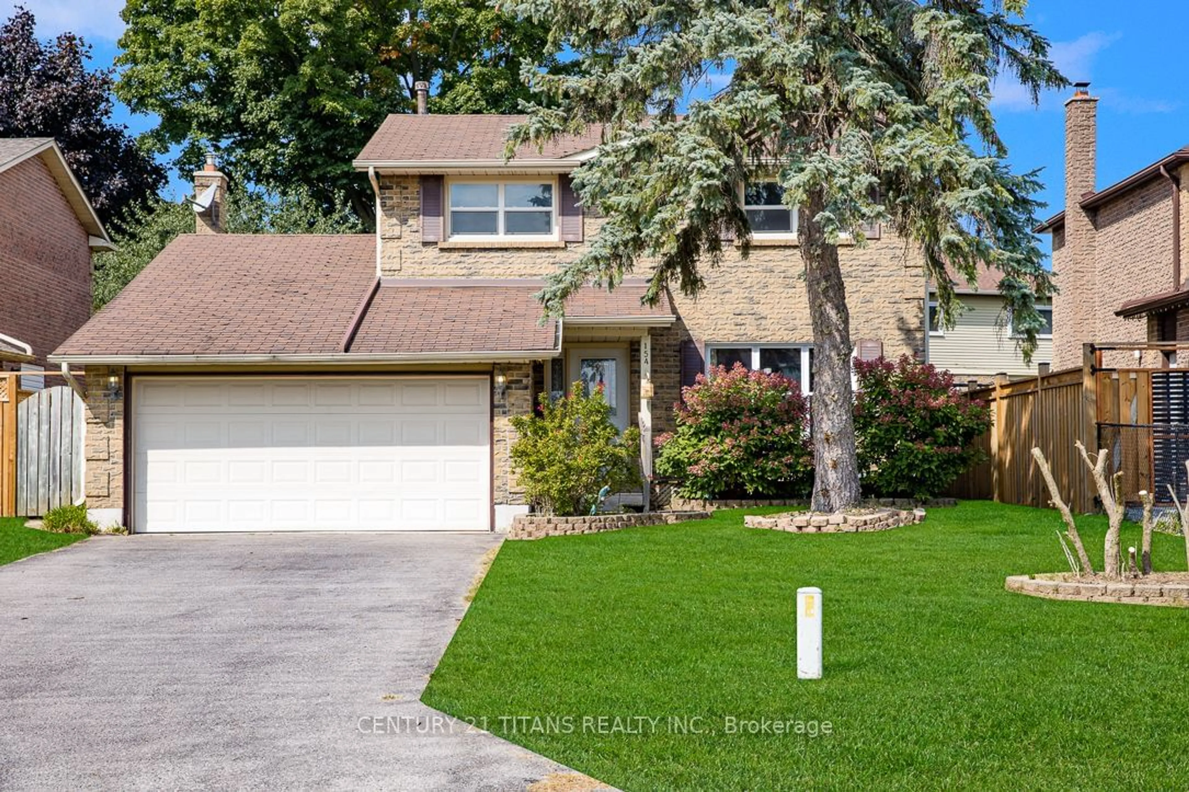 Frontside or backside of a home, the street view for 154 Iroquois Ave, Oshawa Ontario L1G 7P6