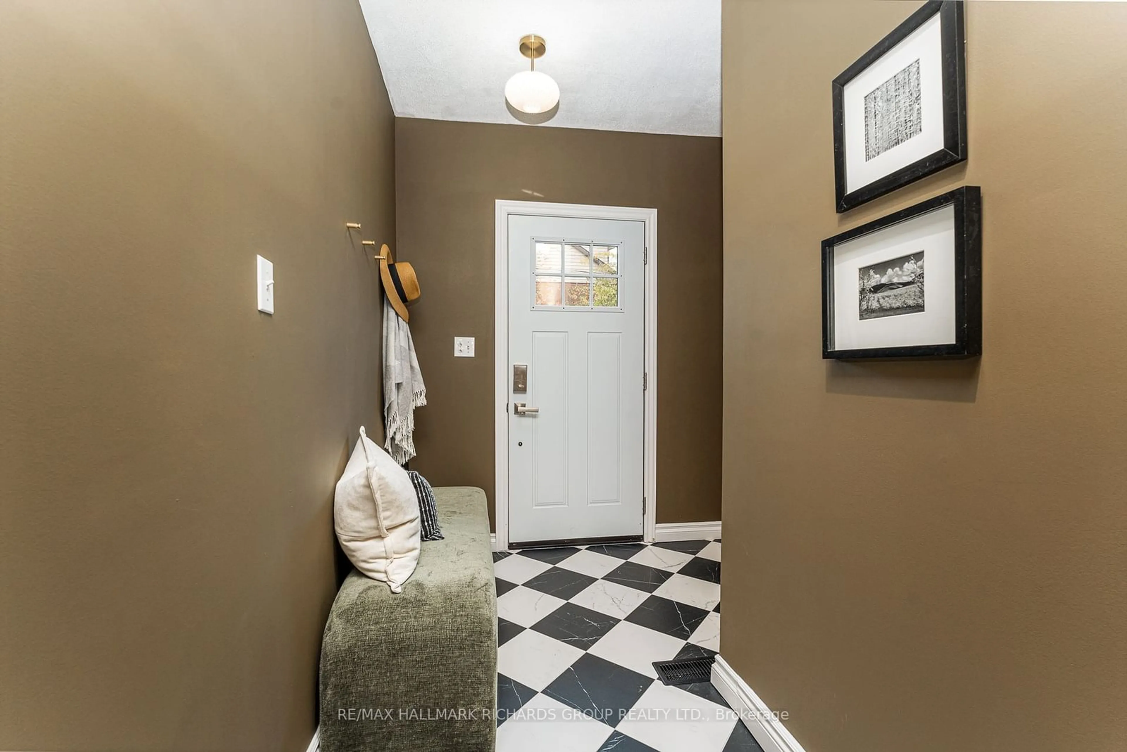 Indoor entryway, wood floors for 48 Lockwood Rd, Toronto Ontario M4L 3M8