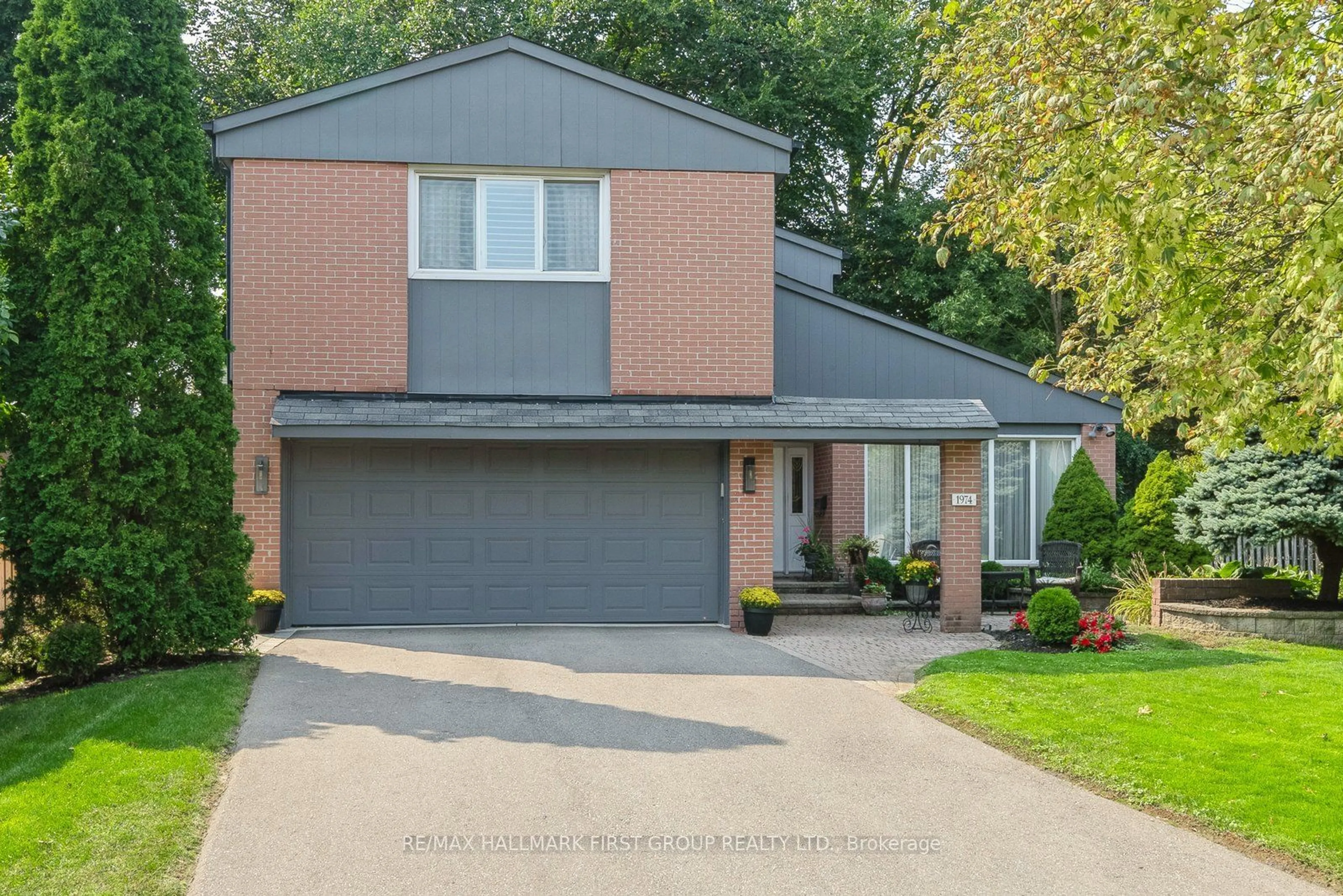 Frontside or backside of a home, the street view for 1974 Spruce Hill Rd, Pickering Ontario L1V 1S7