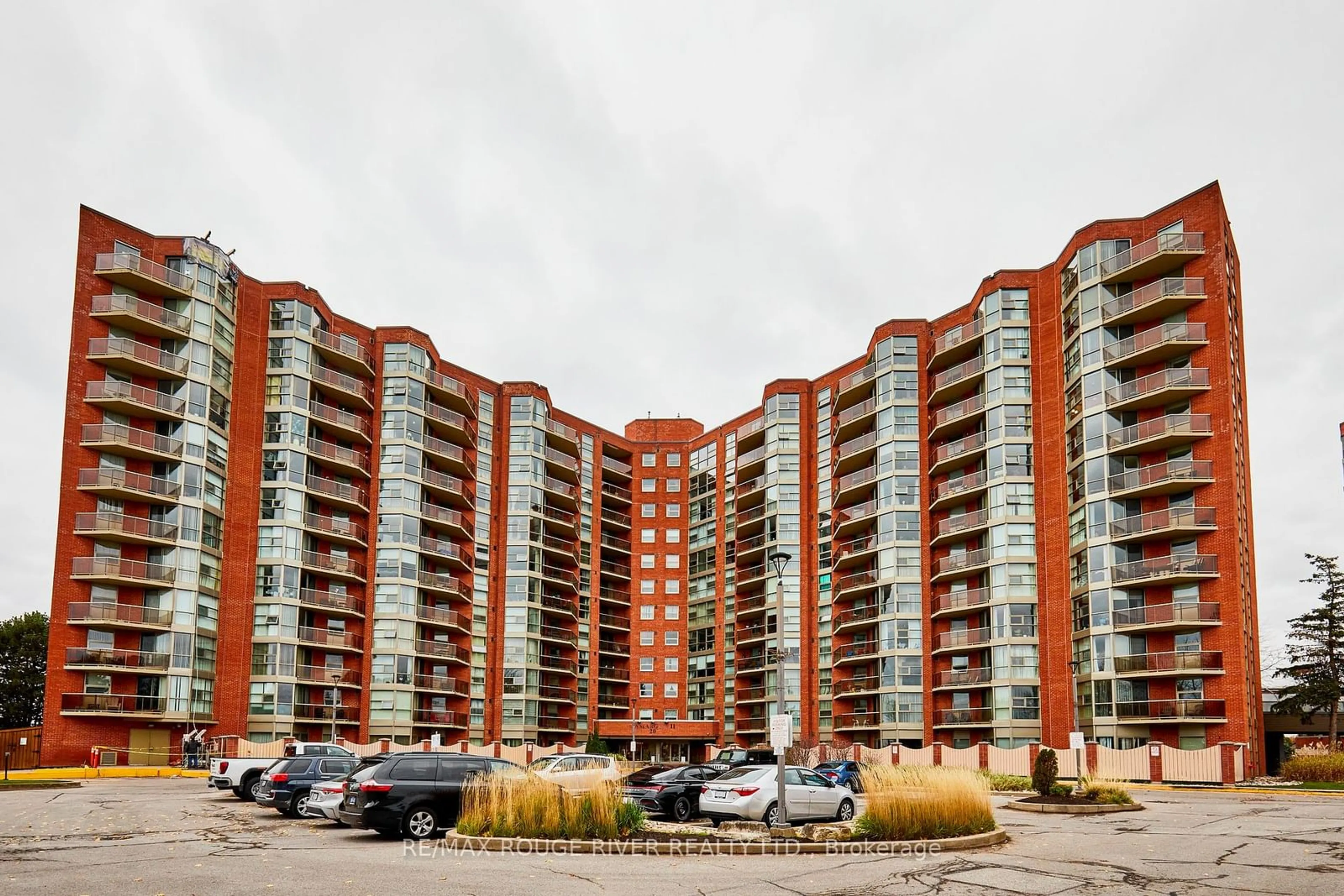 A pic from exterior of the house or condo, the street view for 20 Dean Park Rd #716, Toronto Ontario M1B 3G9