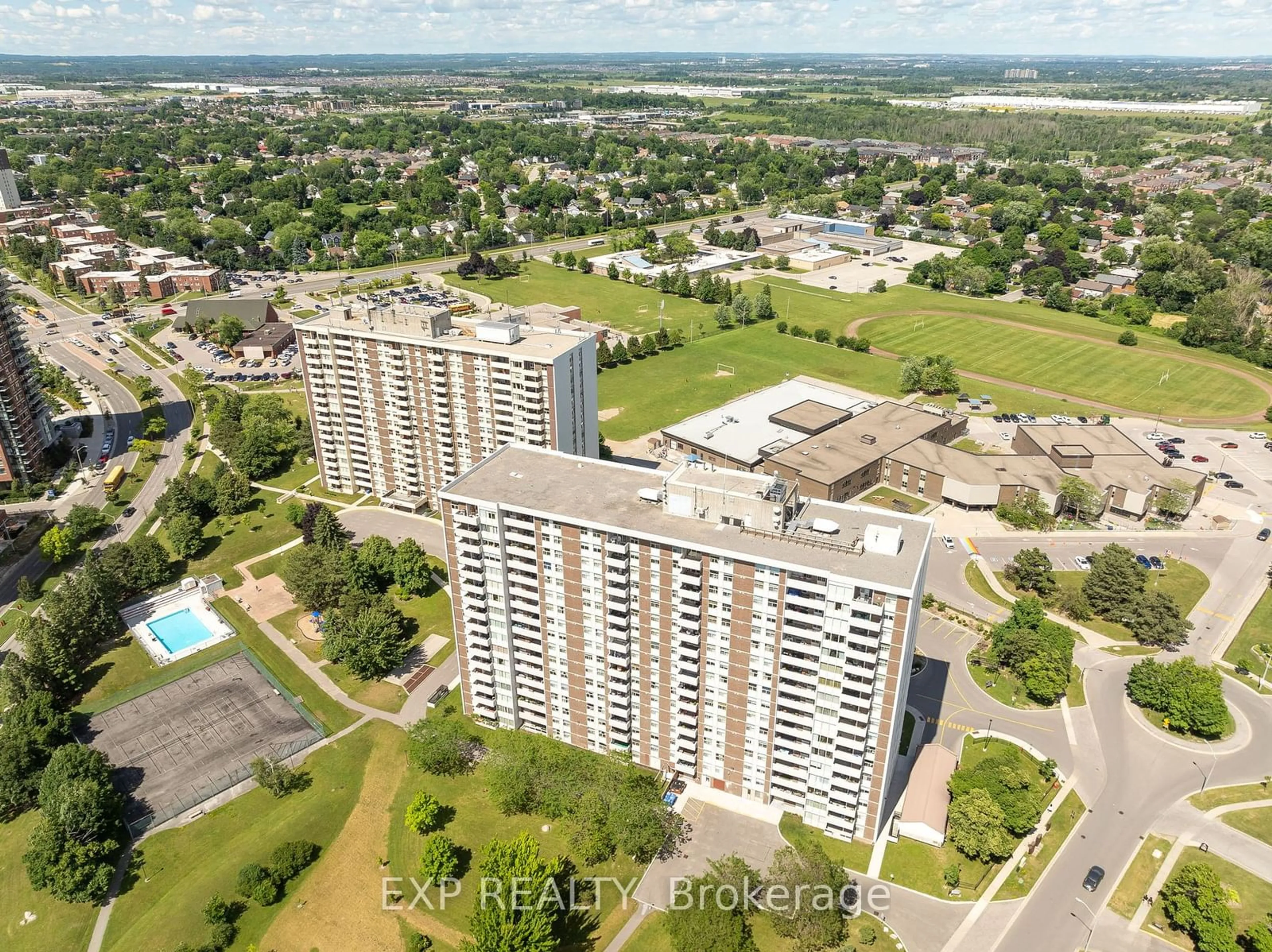 A pic from exterior of the house or condo, the view of city buildings for 44 Falby Crt #1410, Ajax Ontario L1S 3L1