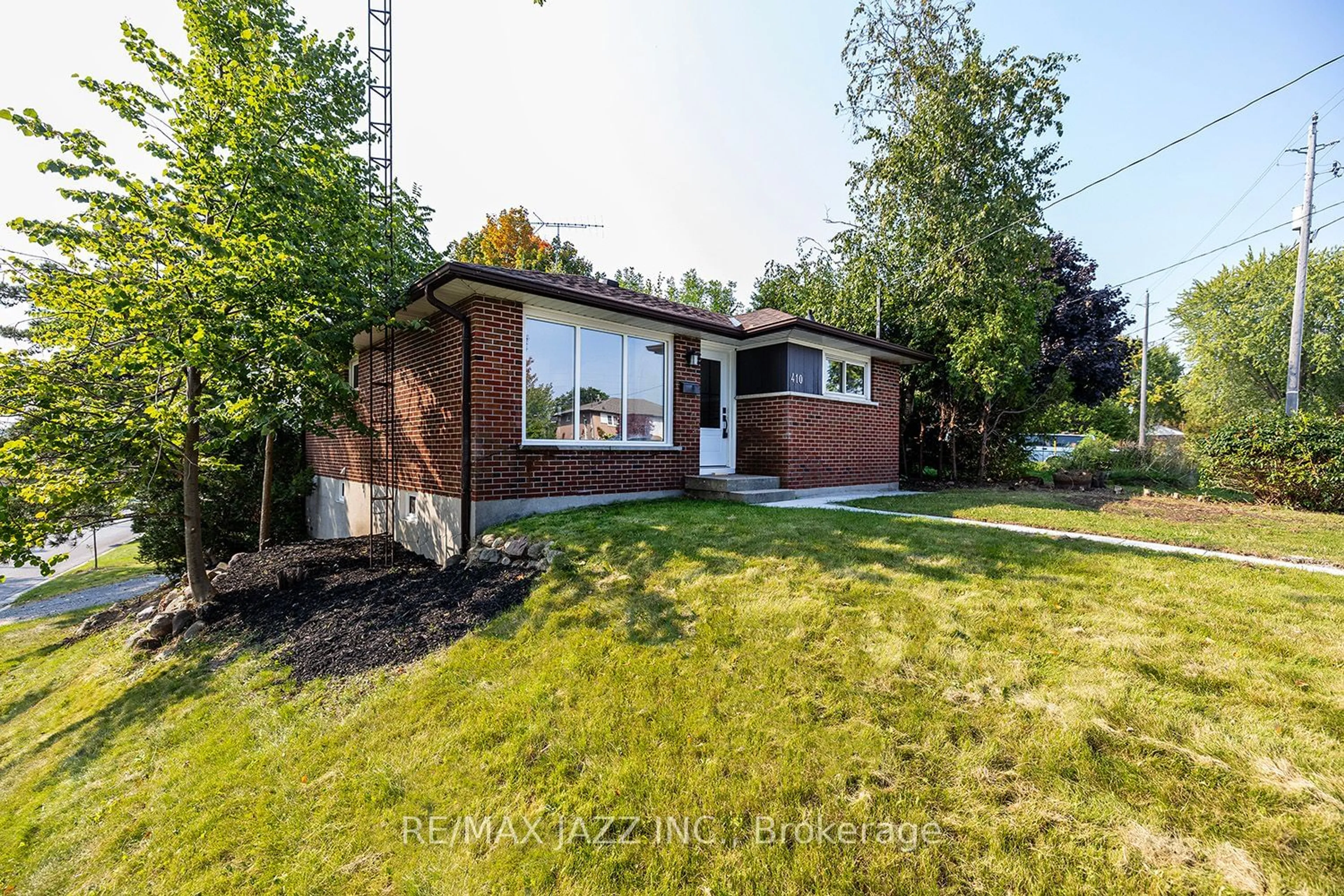 Frontside or backside of a home, the fenced backyard for 410 Elizabeth St, Oshawa Ontario L1J 5T1