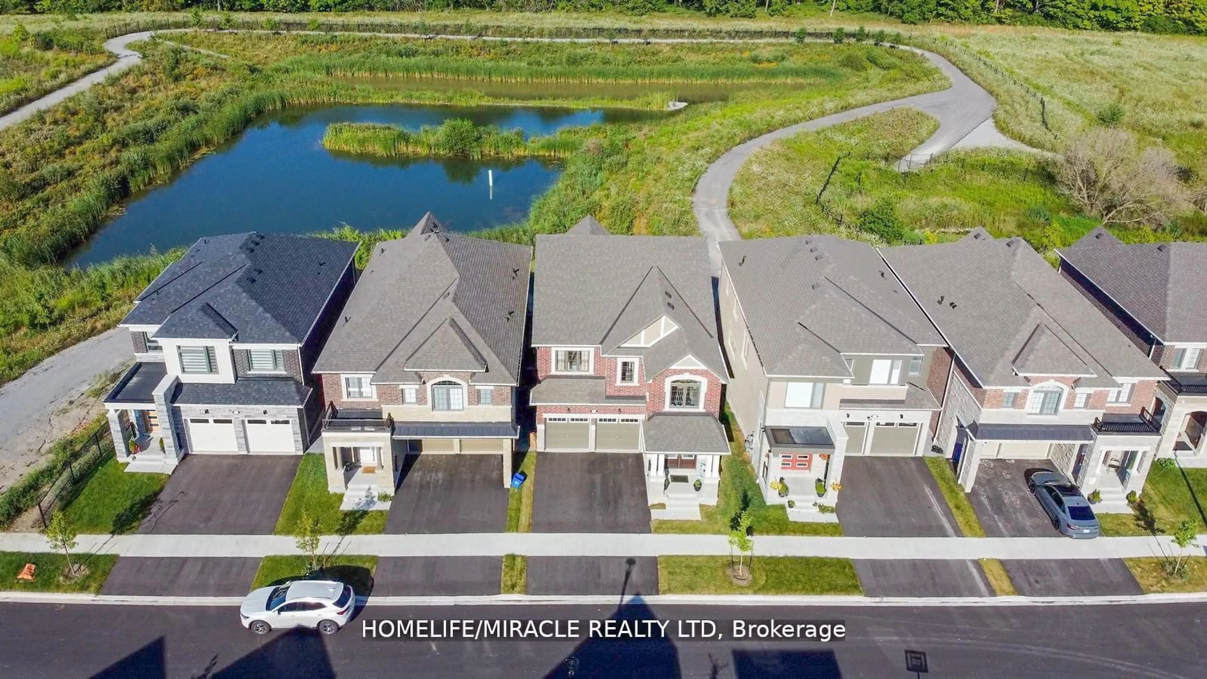 A pic from exterior of the house or condo, the street view for 3283 Turnstone Blvd, Pickering Ontario L1X 0M9