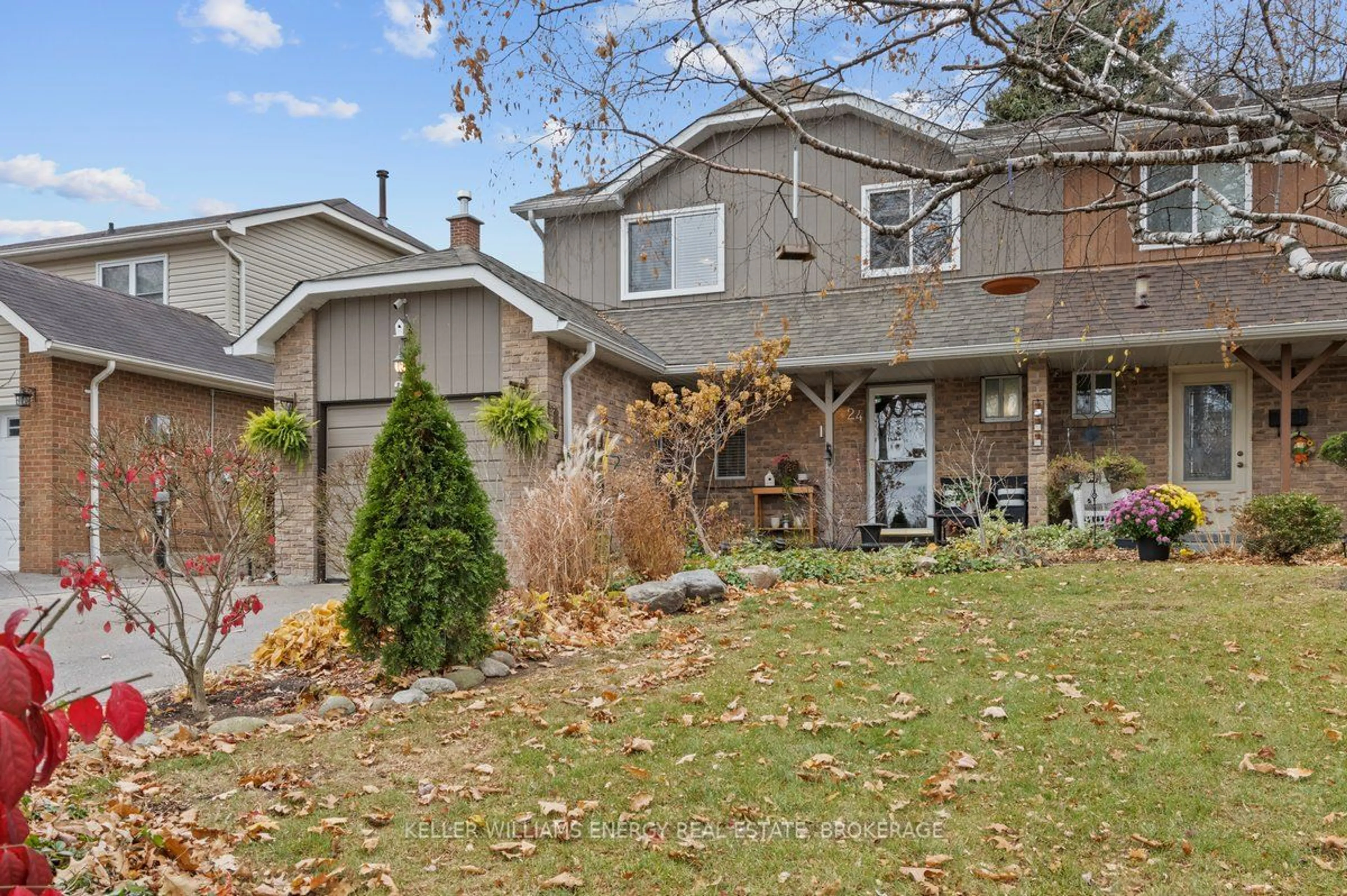 A pic from exterior of the house or condo, the fenced backyard for 24 Goodfellow St, Whitby Ontario L1P 1C4