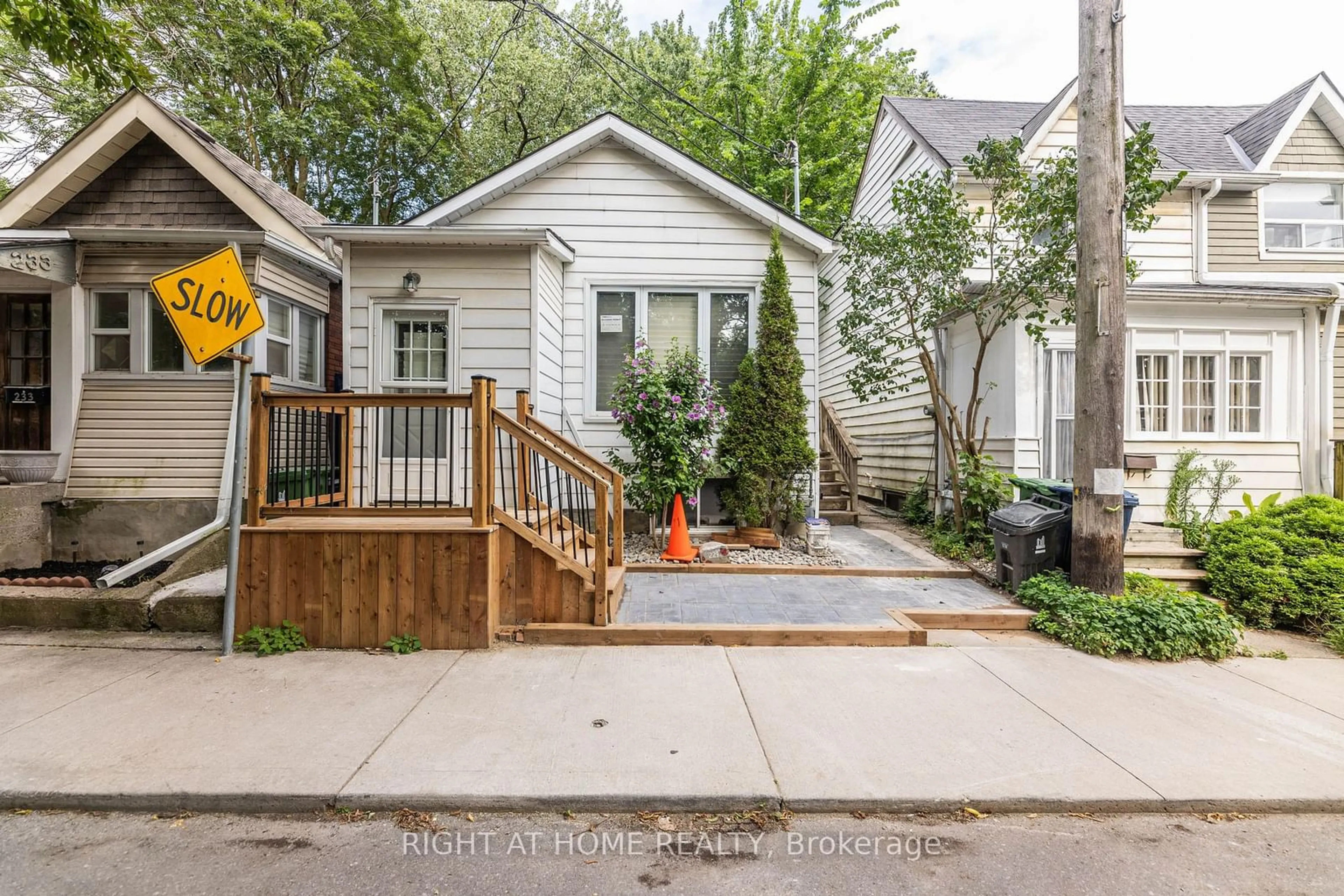 Frontside or backside of a home, the street view for 229 Craven Rd, Toronto Ontario M4L 2Z5