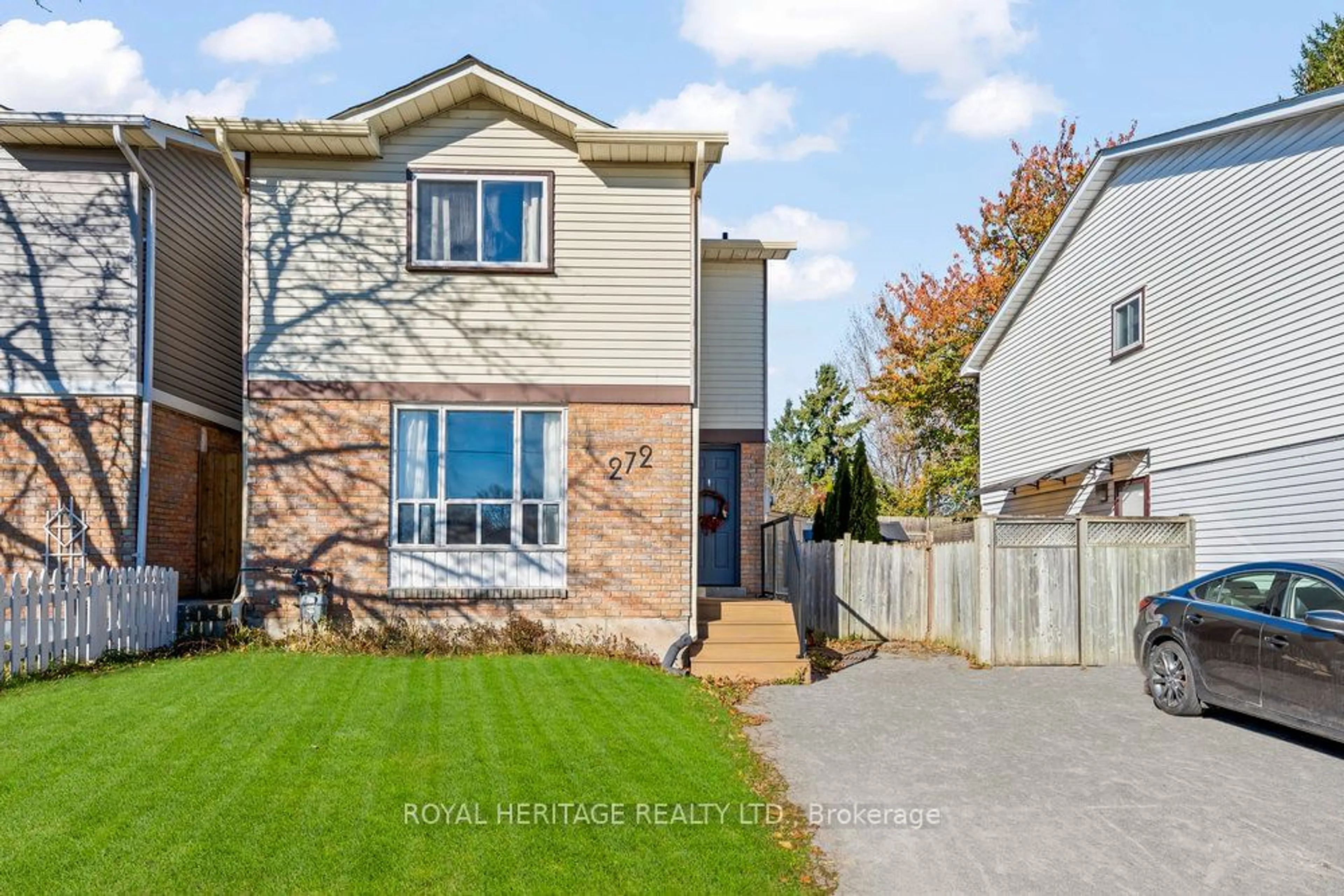 Frontside or backside of a home, the fenced backyard for 272 Phillip Murray Ave, Oshawa Ontario L1J 1G9