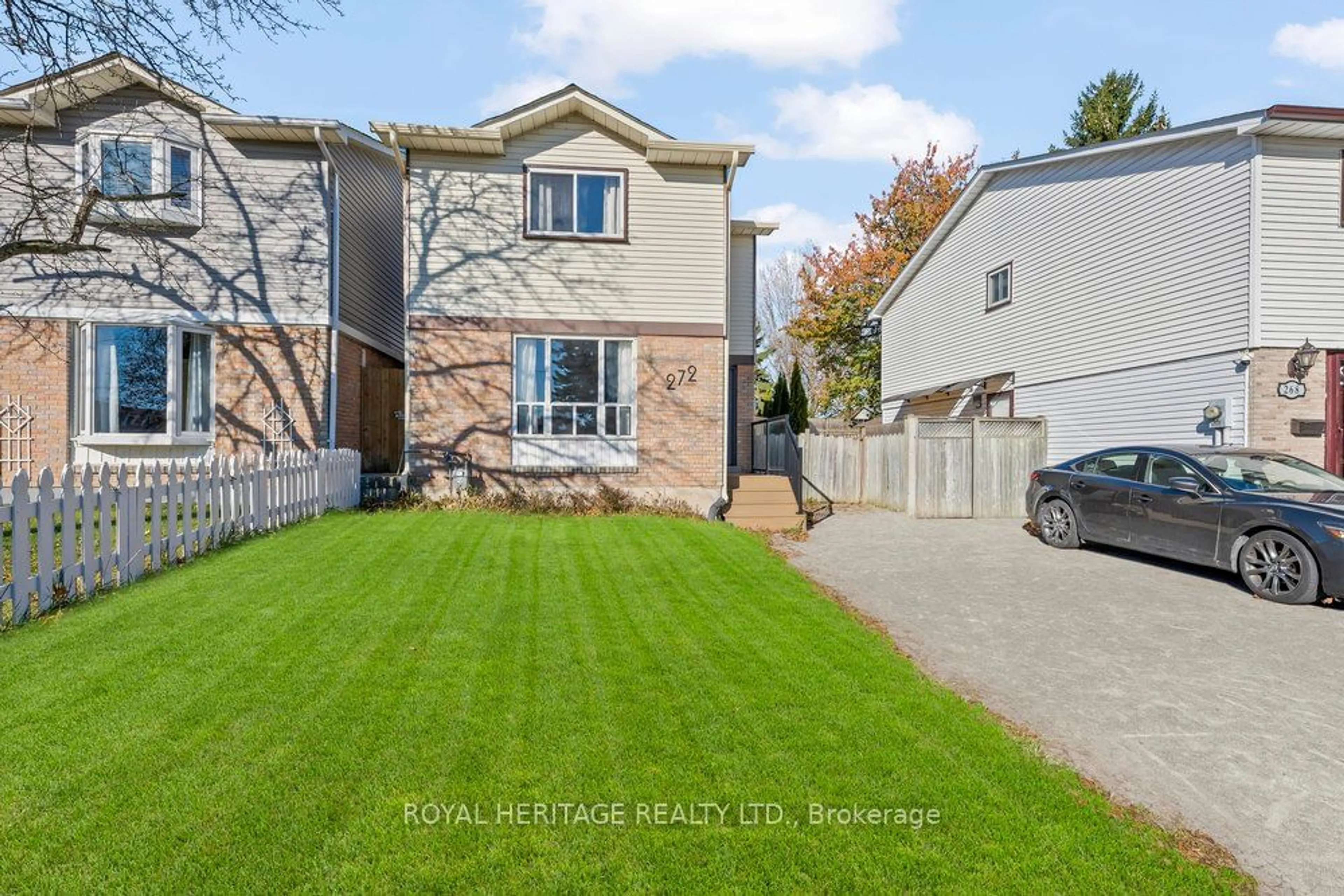 Frontside or backside of a home, the fenced backyard for 272 Phillip Murray Ave, Oshawa Ontario L1J 1G9