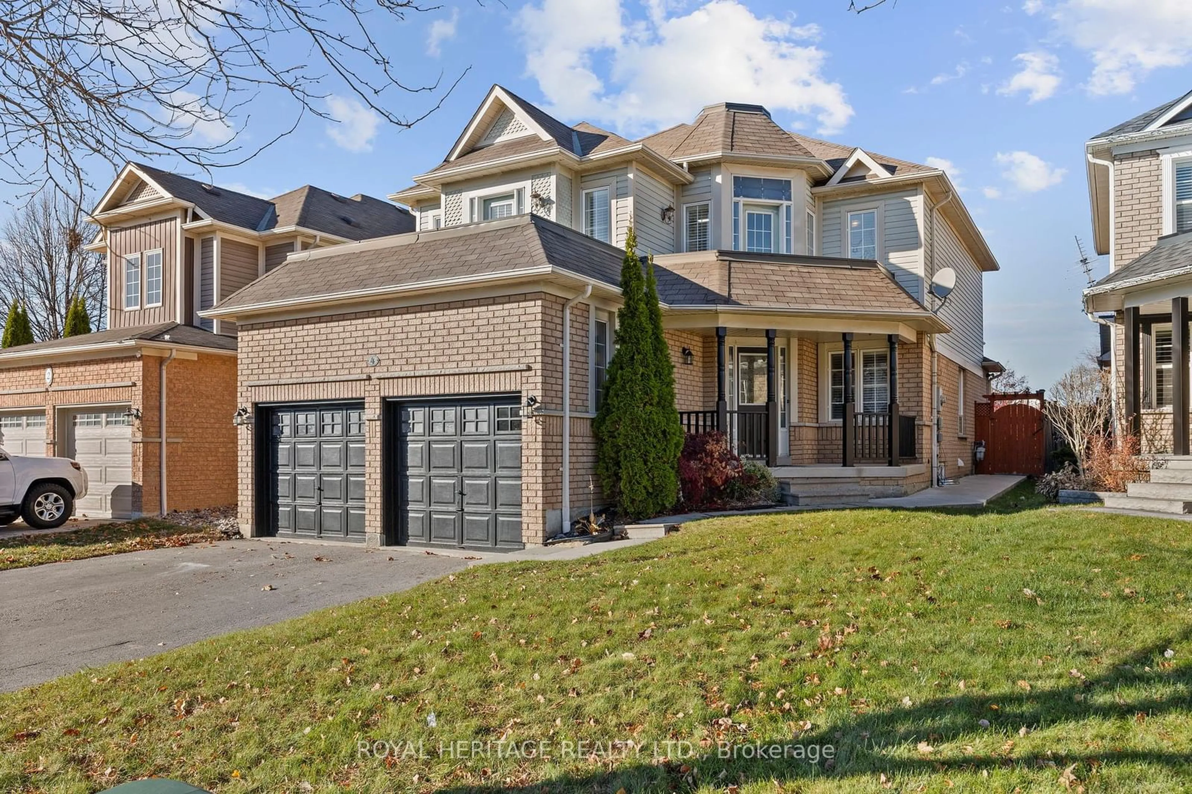 Frontside or backside of a home, the street view for 4 Virginia Dr, Whitby Ontario L1R 2Y1