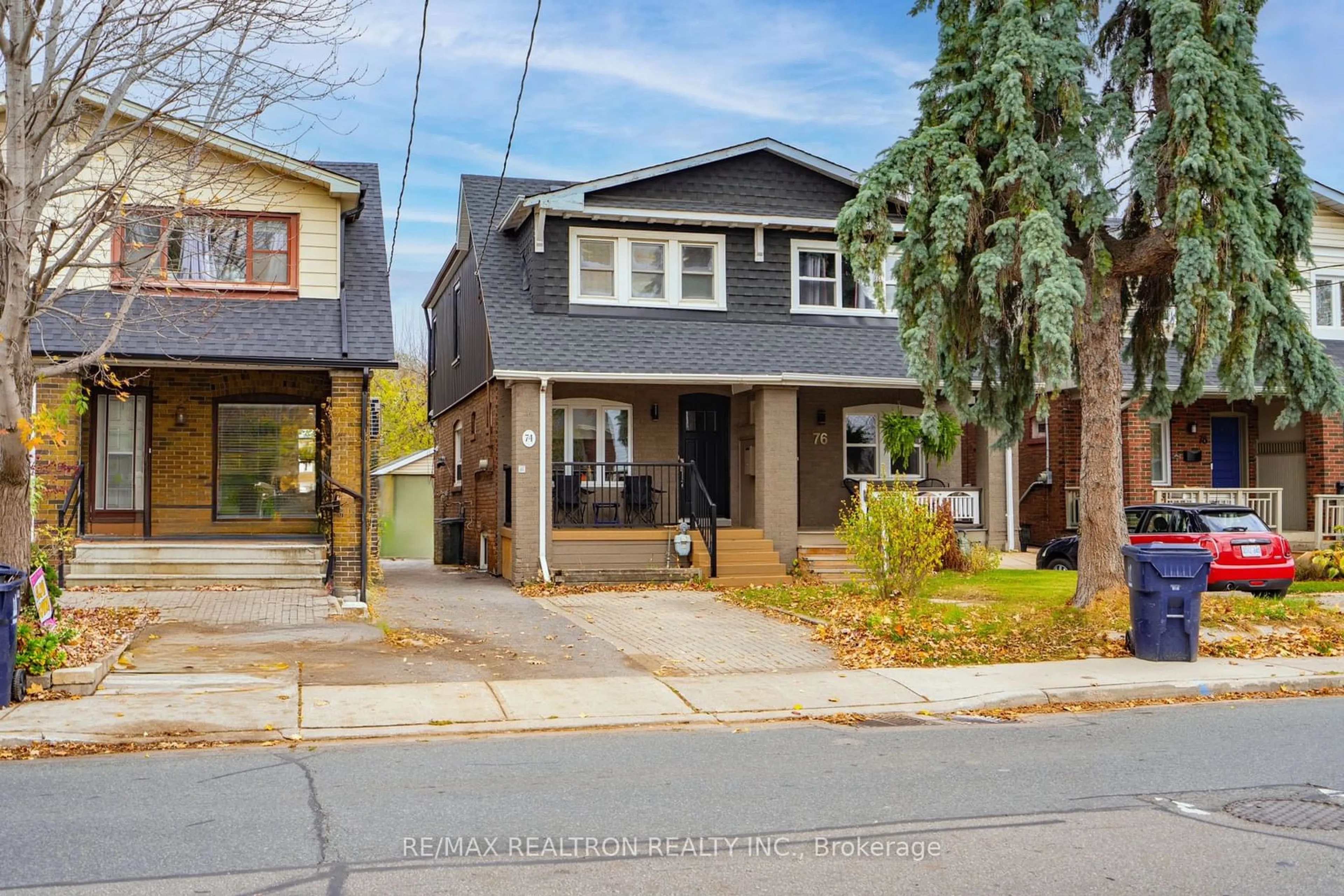 Frontside or backside of a home, the street view for 74 Mortimer Ave, Toronto Ontario M4K 2A1