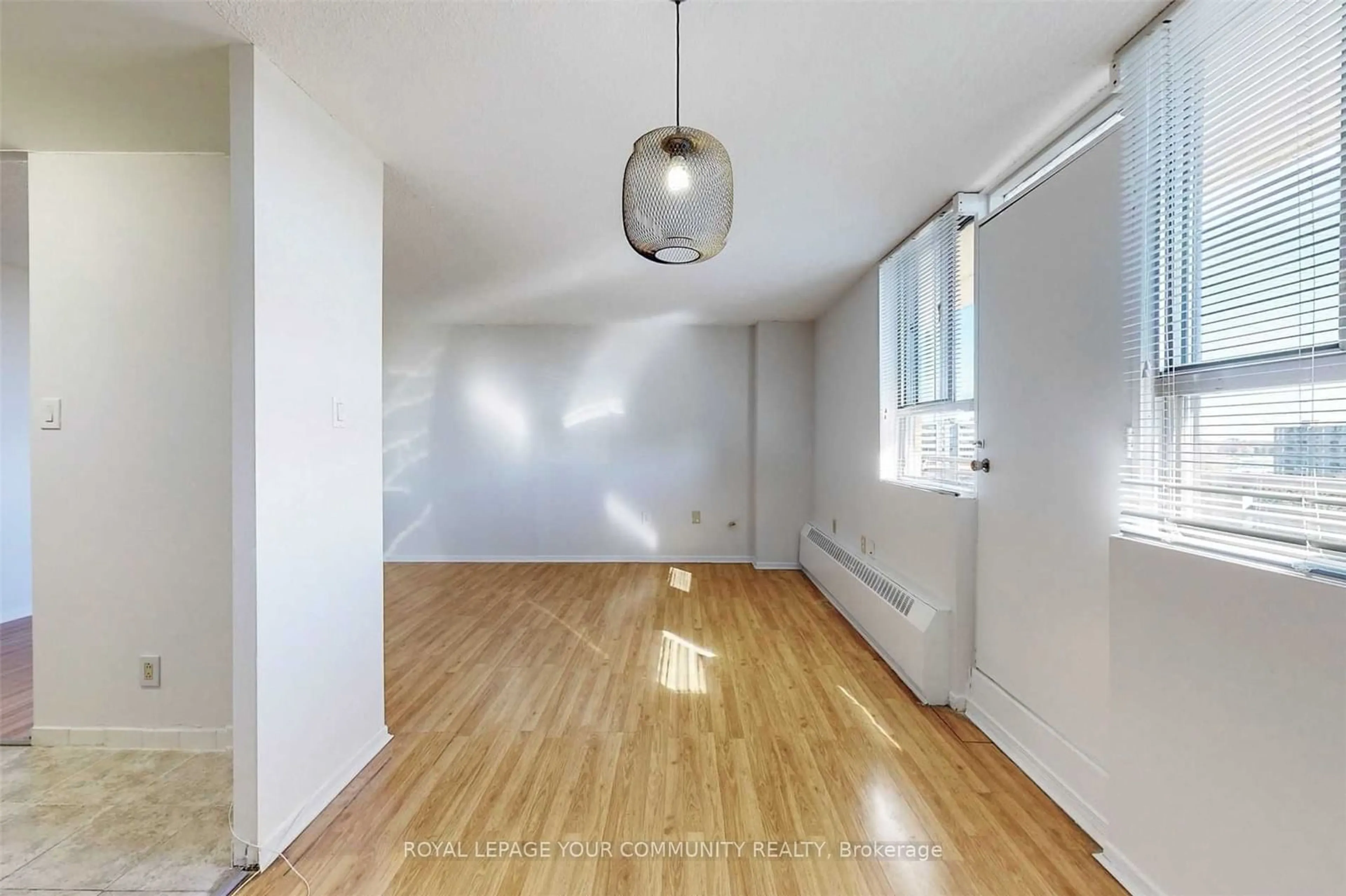 A pic of a room, wood floors for 100 Dundalk Dr #710, Toronto Ontario M1P 4V2