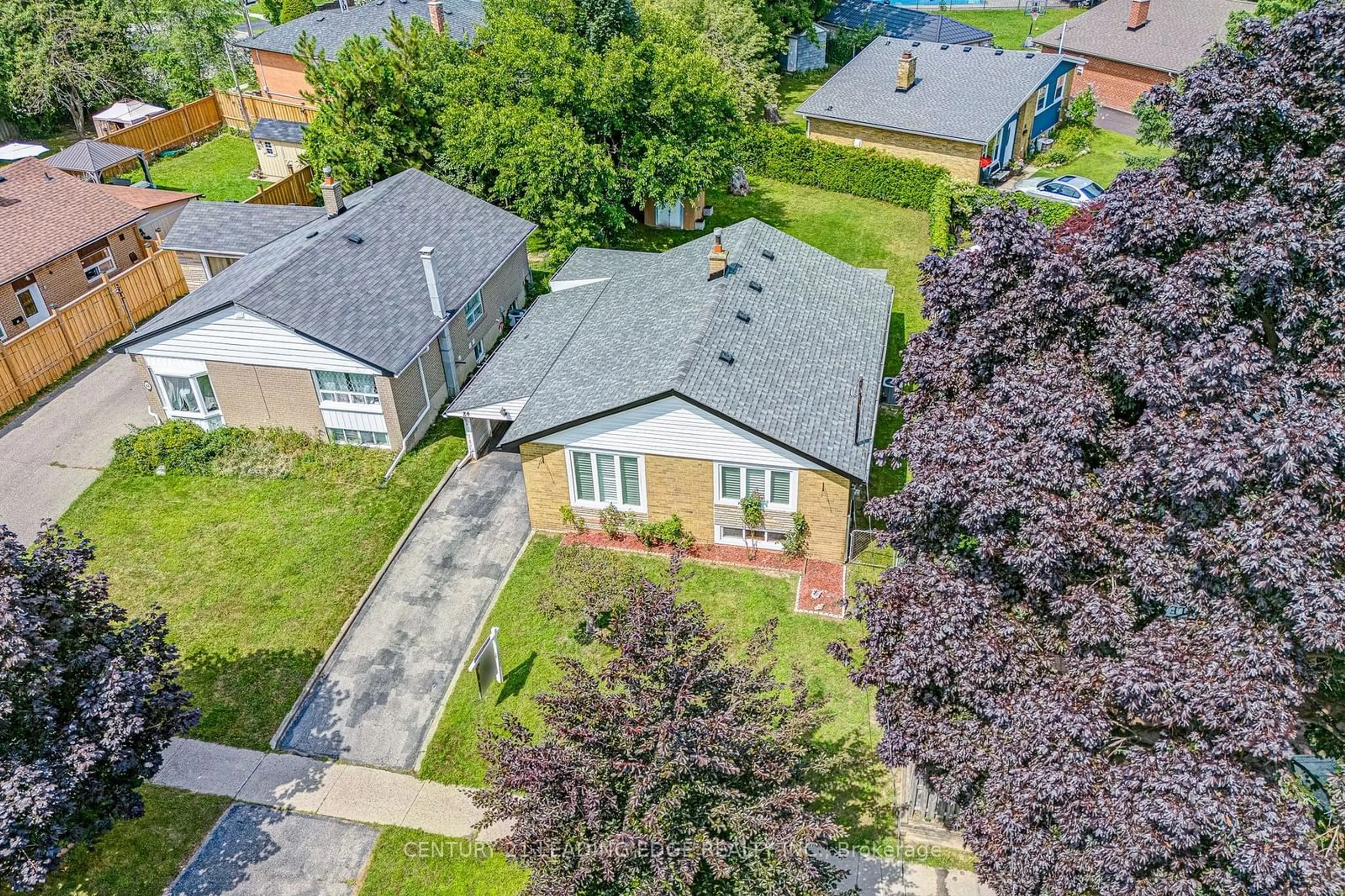 Frontside or backside of a home, the fenced backyard for 84 Pandora Circ, Toronto Ontario M1H 1V7