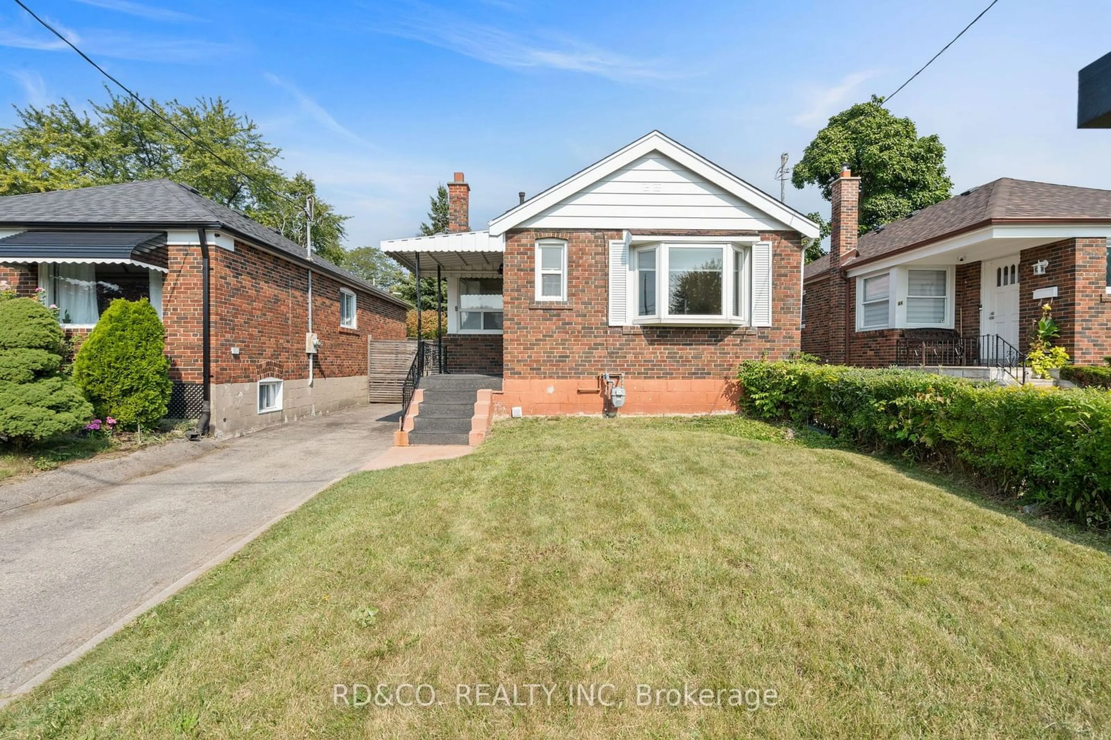 Frontside or backside of a home, the fenced backyard for 42 Tiago Ave, Toronto Ontario M4B 2A1