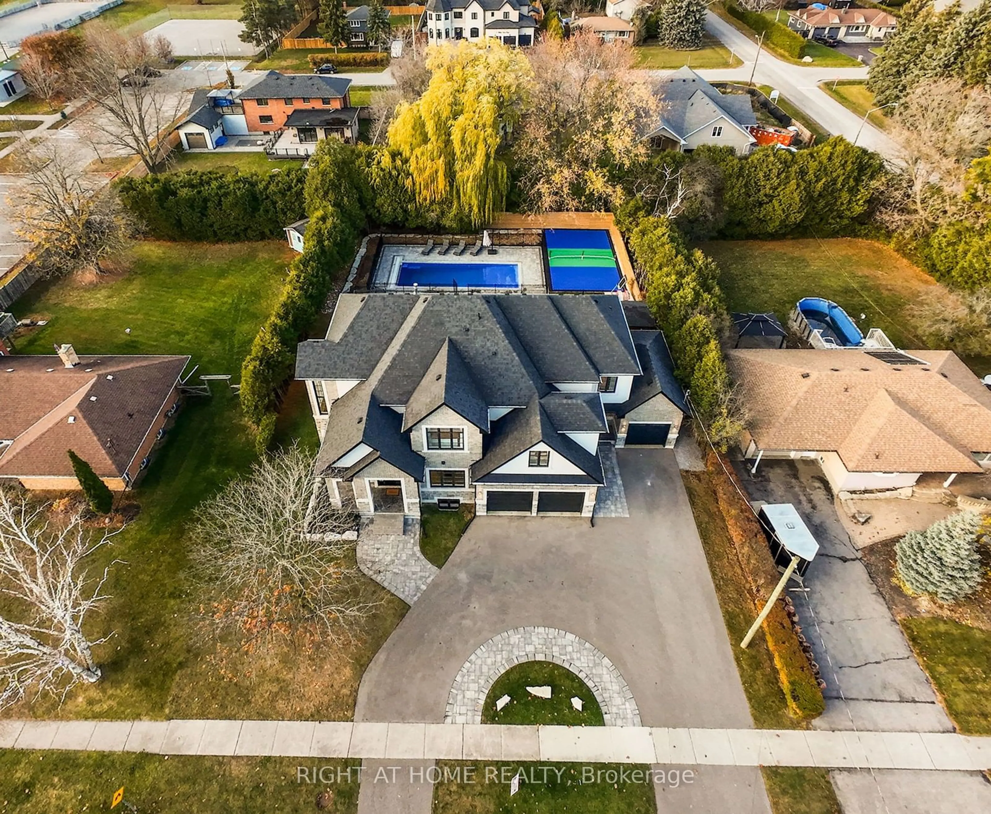 Frontside or backside of a home, the fenced backyard for 36 Dymond Dr, Whitby Ontario L1N 3N2